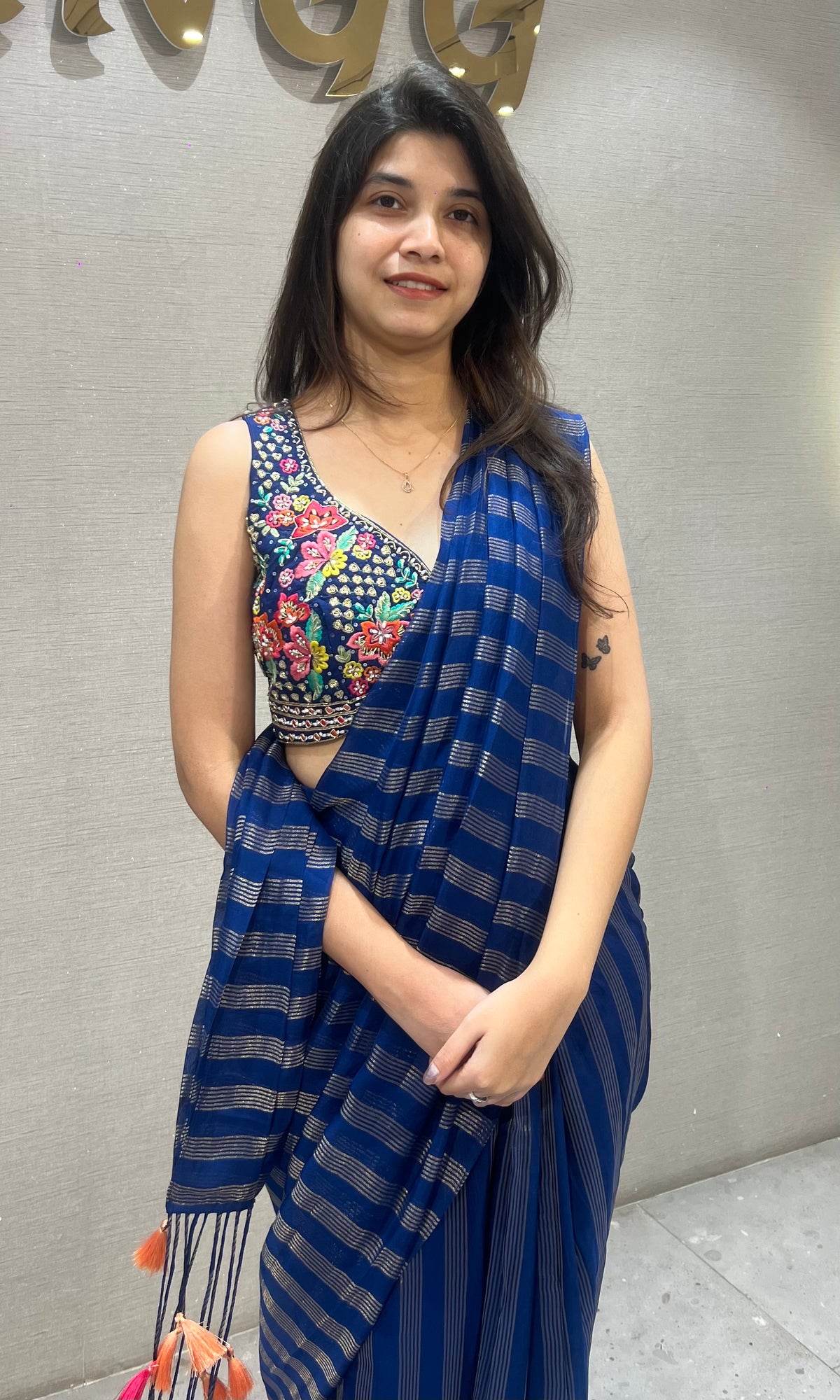 blue and silver striped Drape saree with intricate blouse