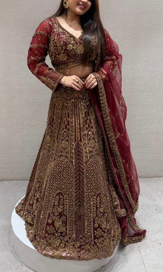 Deep red and gold lehenga