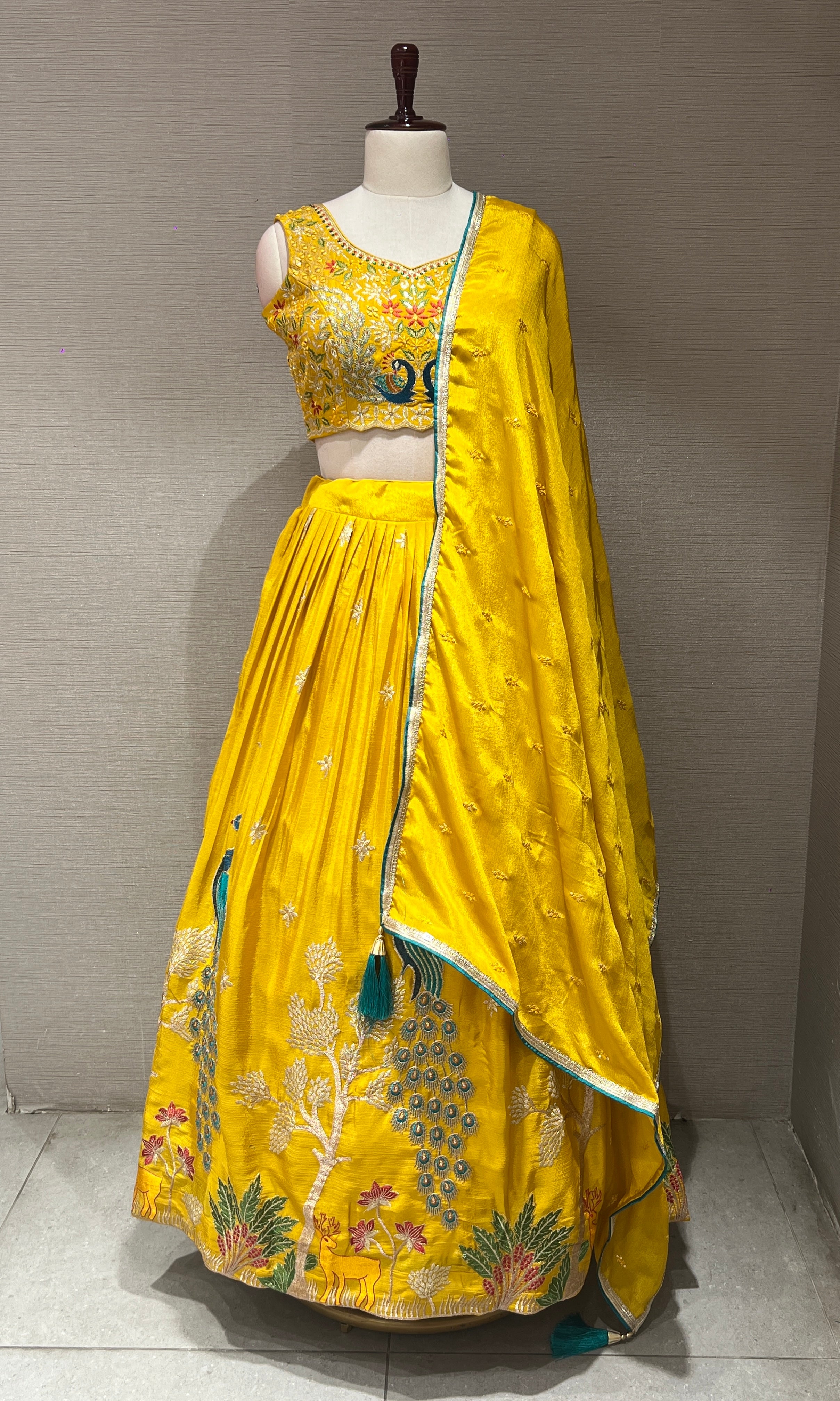 yellow lehenga with peacock design