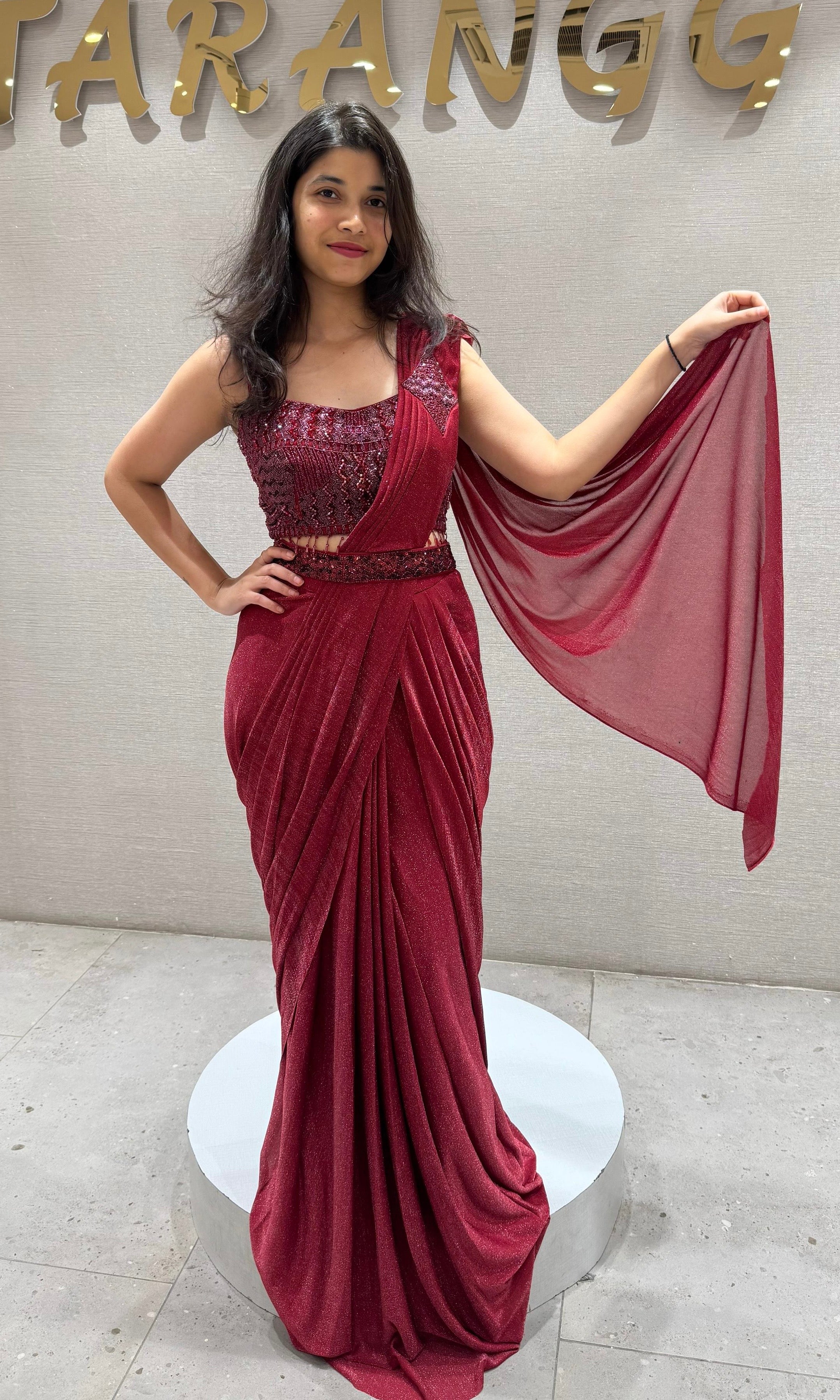 Maroon sequin embroidered drape saree