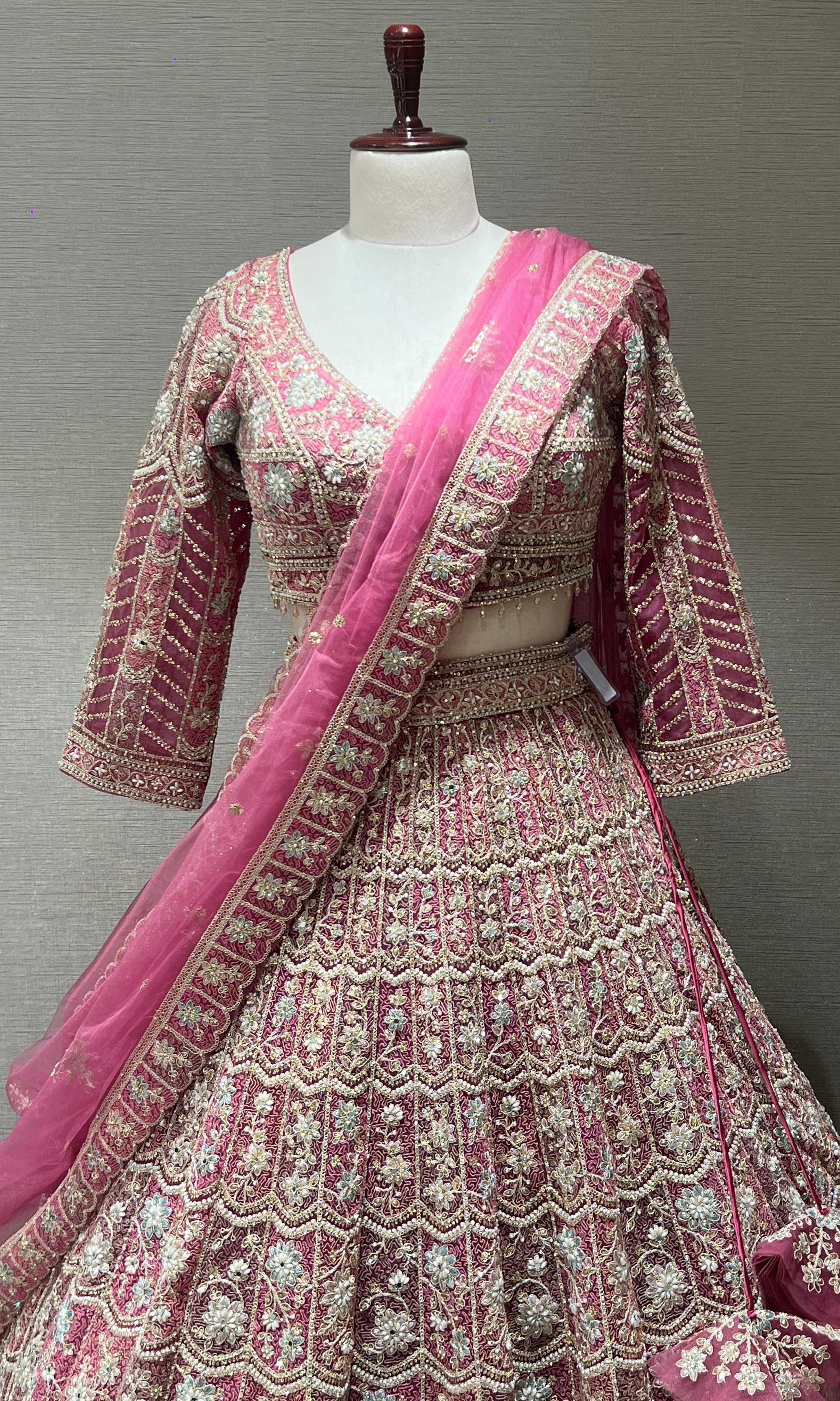 Pink lehenga with intricate embroidery and zari work