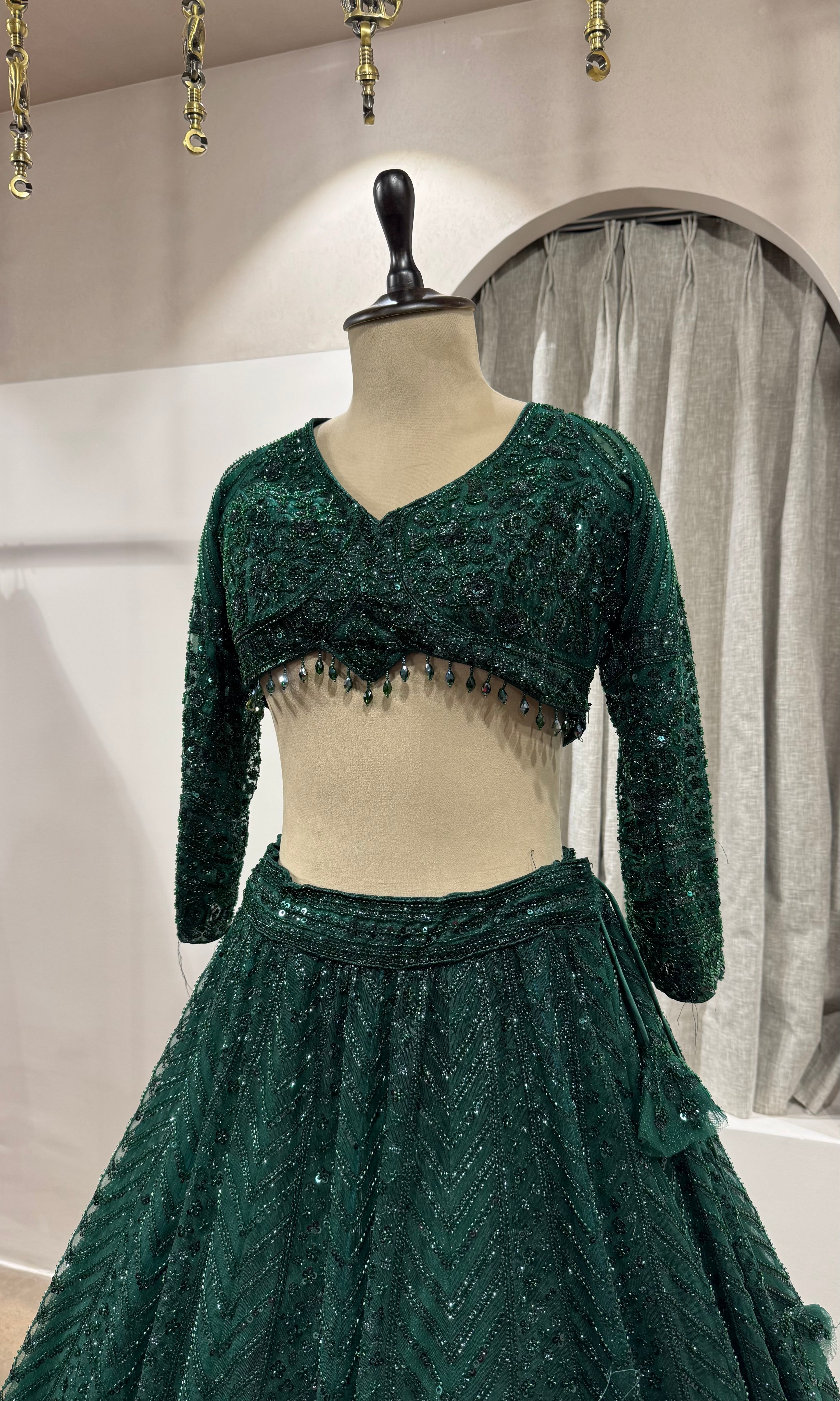 emerald green net lehenga choli
