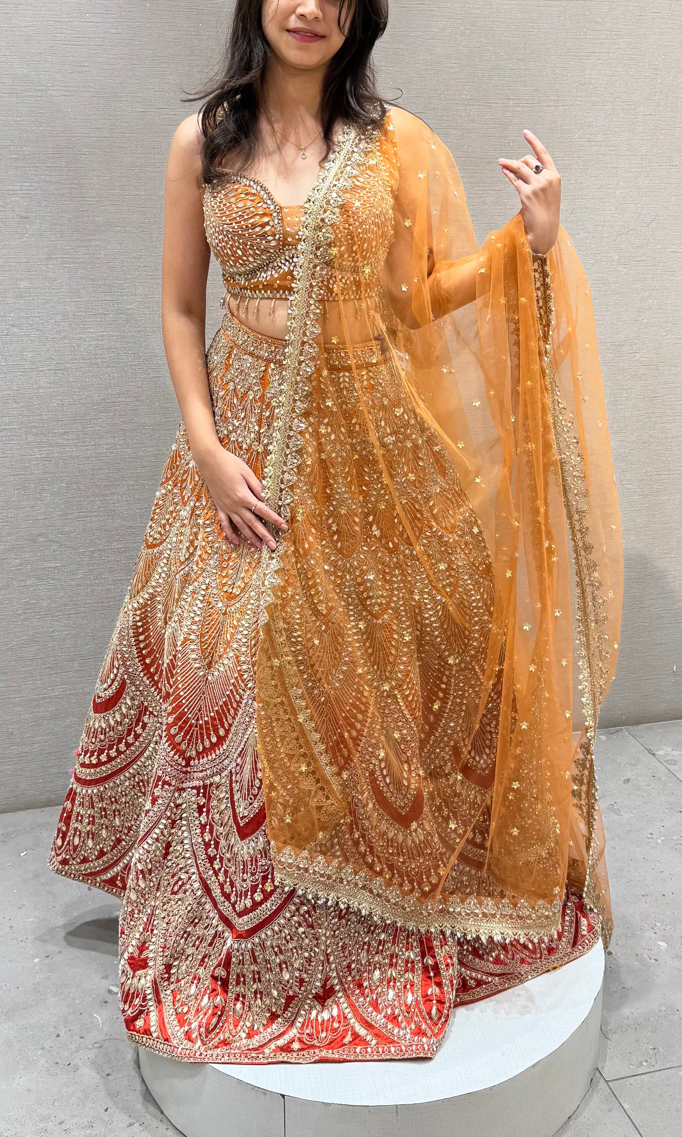 Ornate Rust and Gold Silk Lehenga Choli