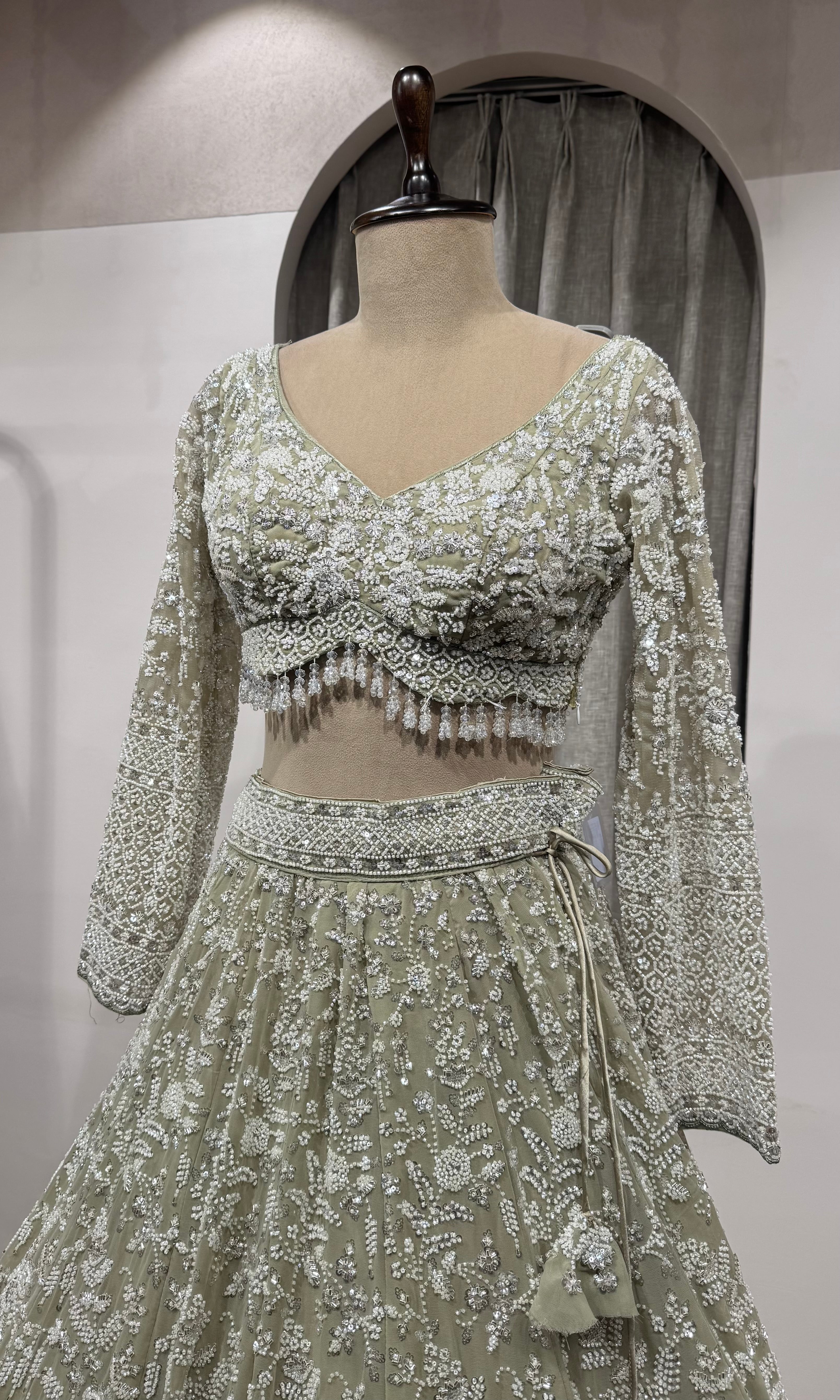 Sage Green Heavily Embroidered Net Bridal Lehenga