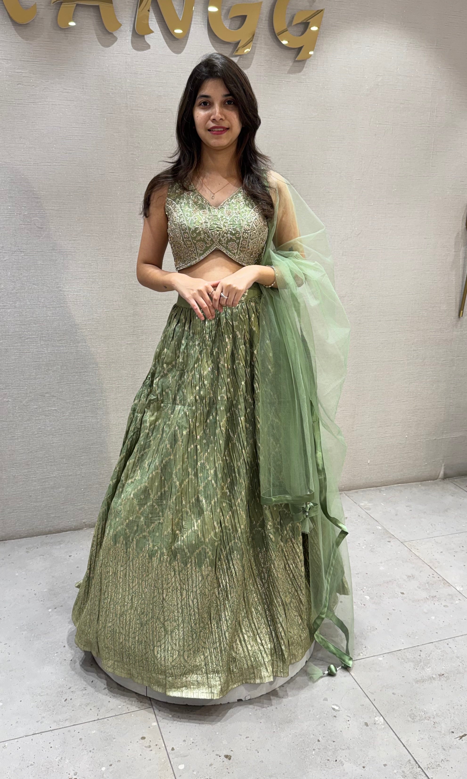 Pista Green Embroidered Net Lehenga Choli