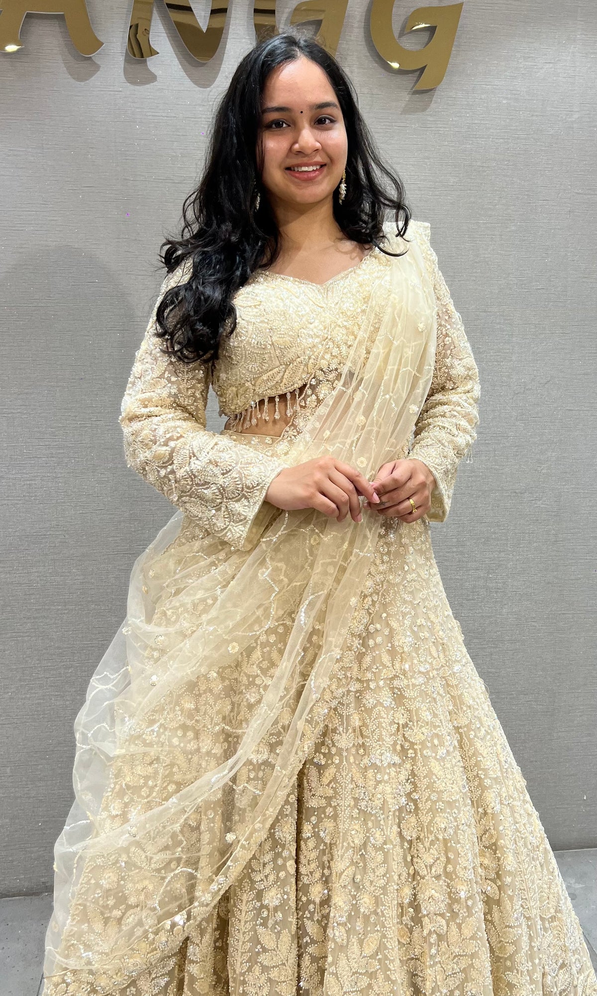 Cream soft net intricate floral Embroidery bridal lehenga