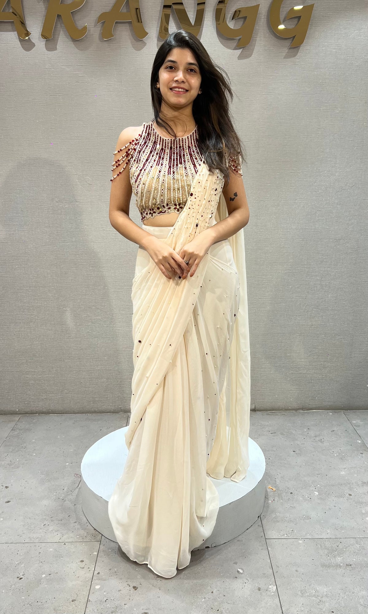 Cream Georgette Saree with Beaded Halter Blouse