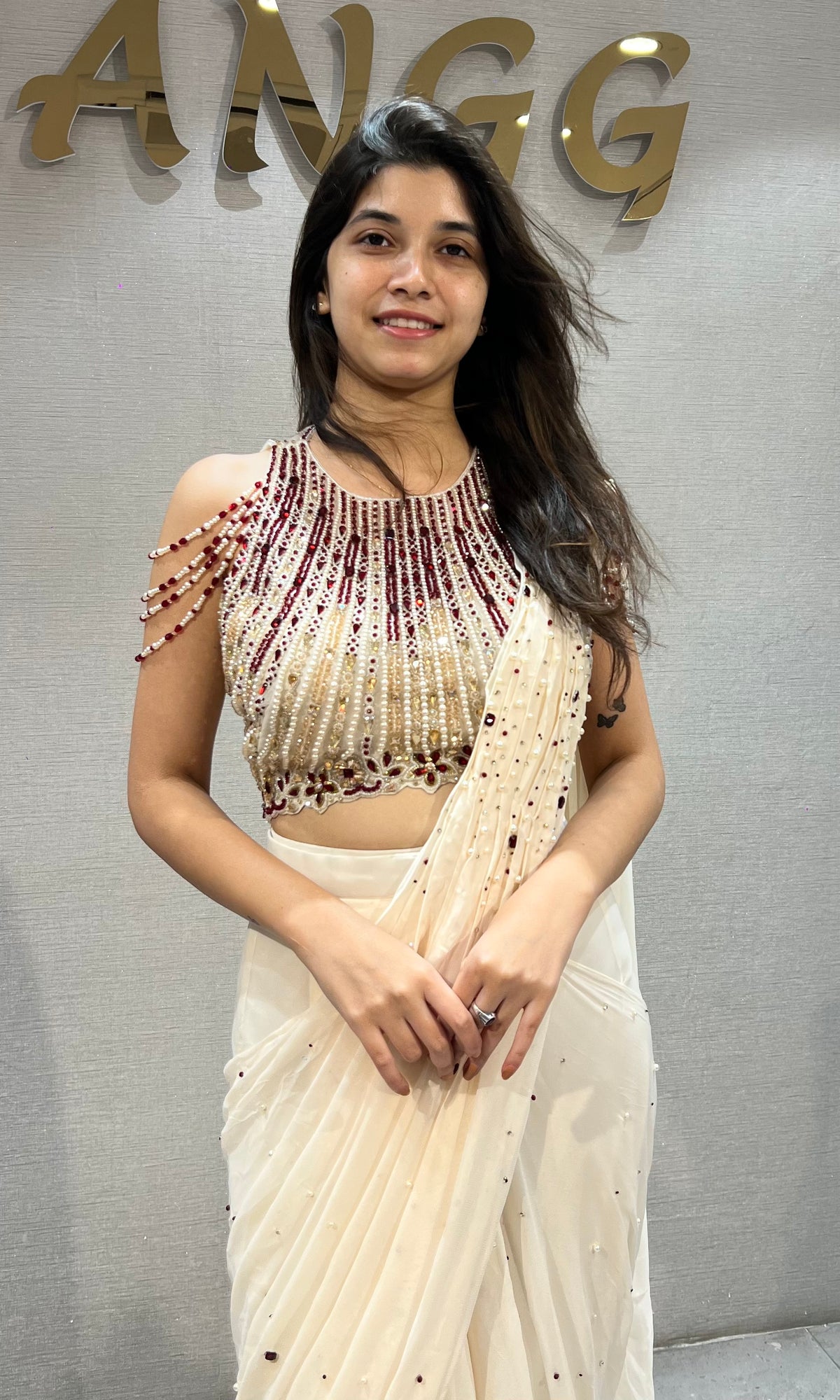 Cream Georgette Saree with Beaded Halter Blouse