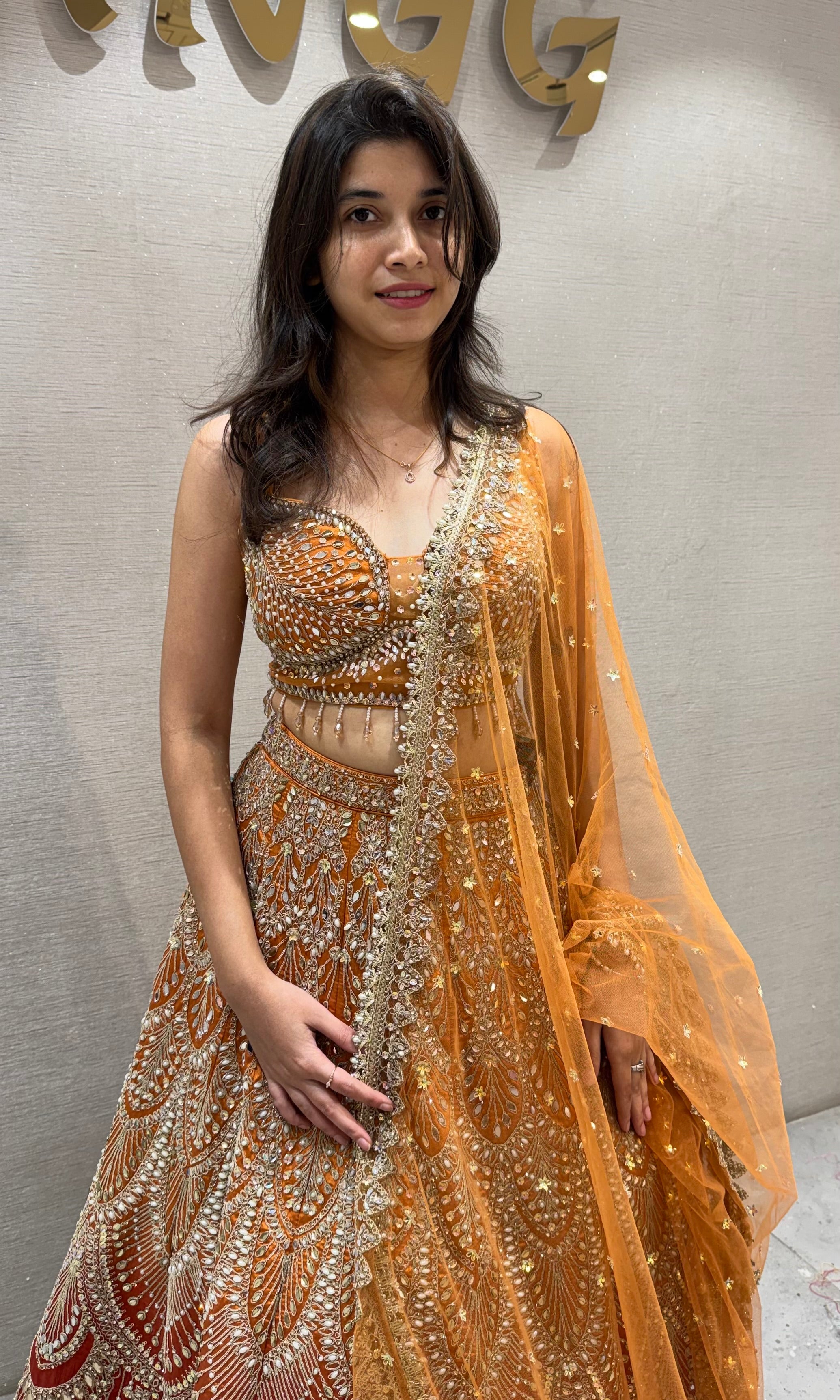 Ornate Rust and Gold Silk Lehenga Choli