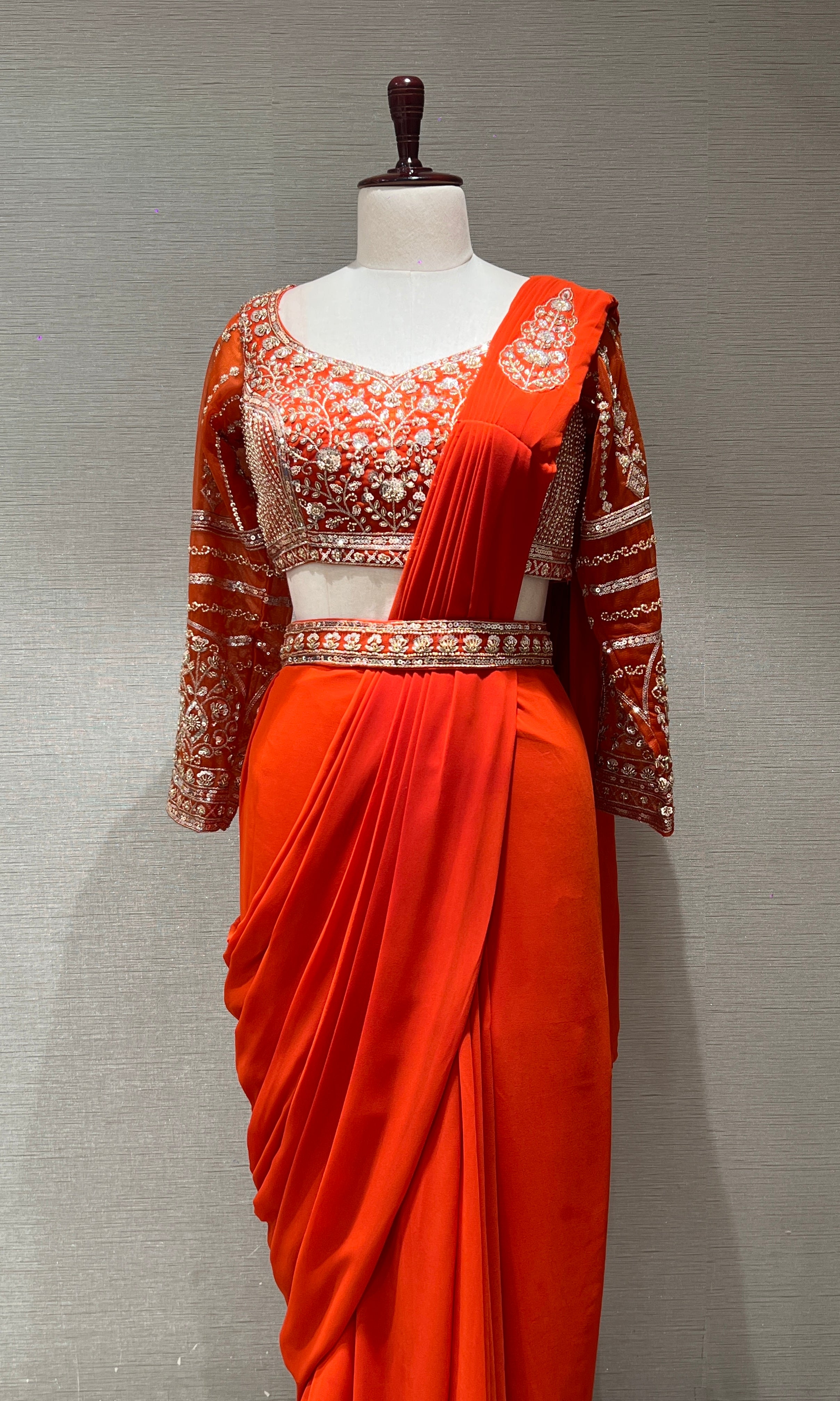 ORANGE drape saree with embellished blouse