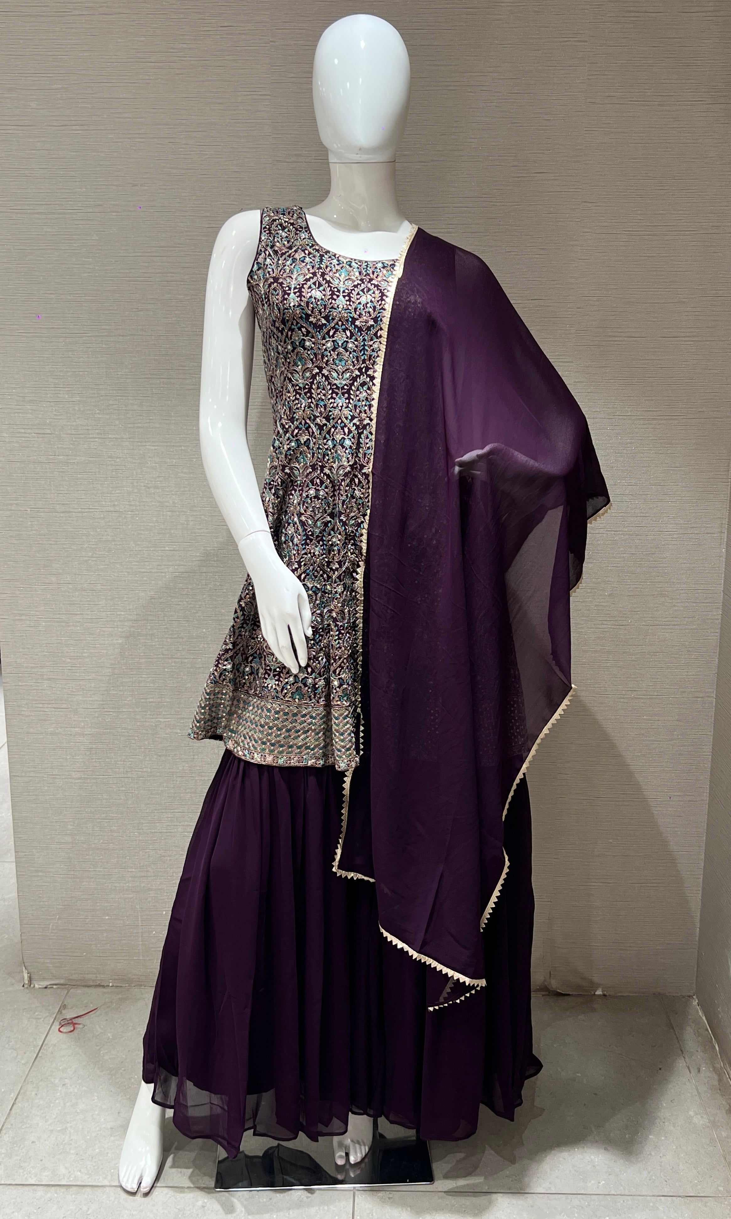 purple sharara with embroidery peplum top