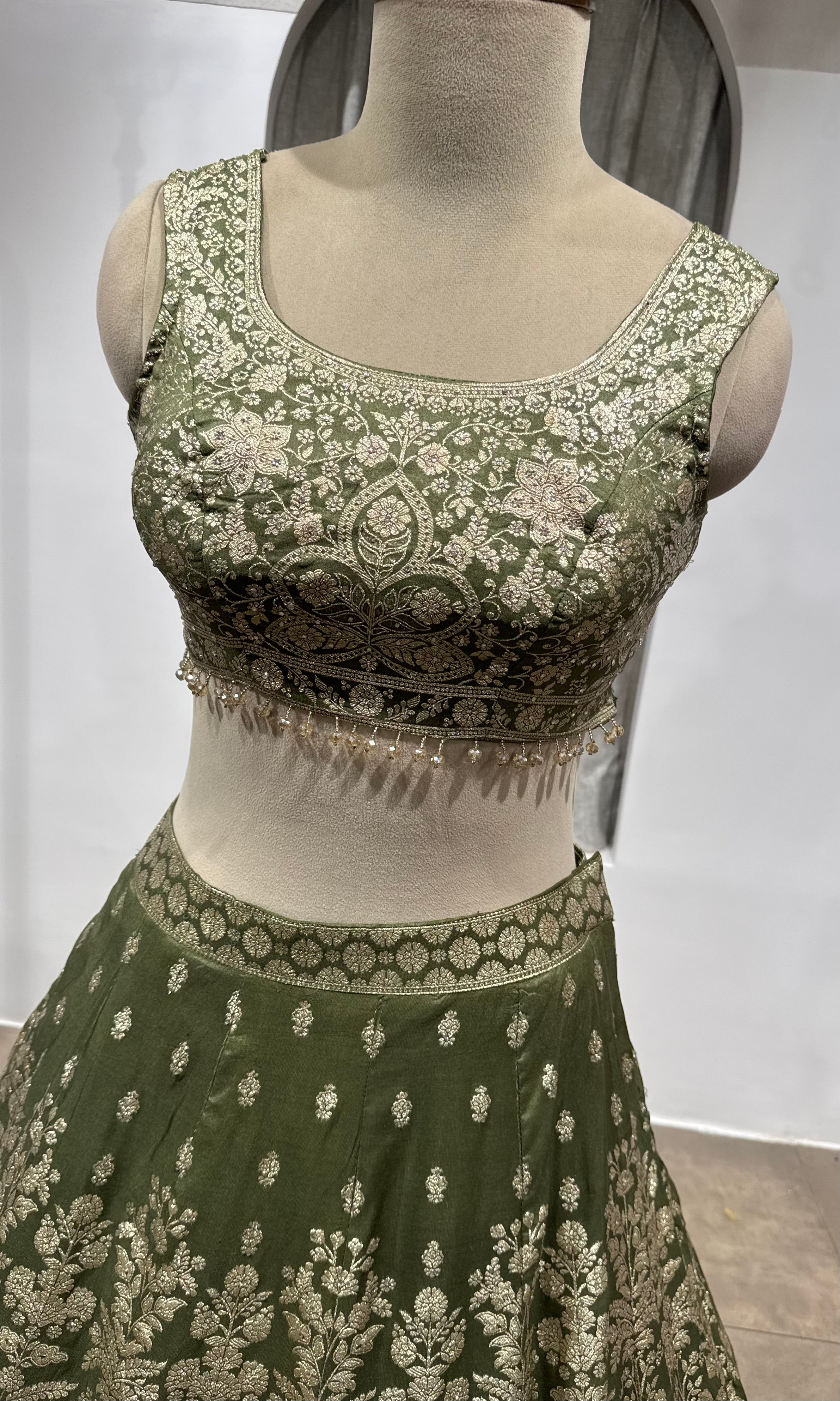 Mehendi Green Net Cord Embroidery Lehenga