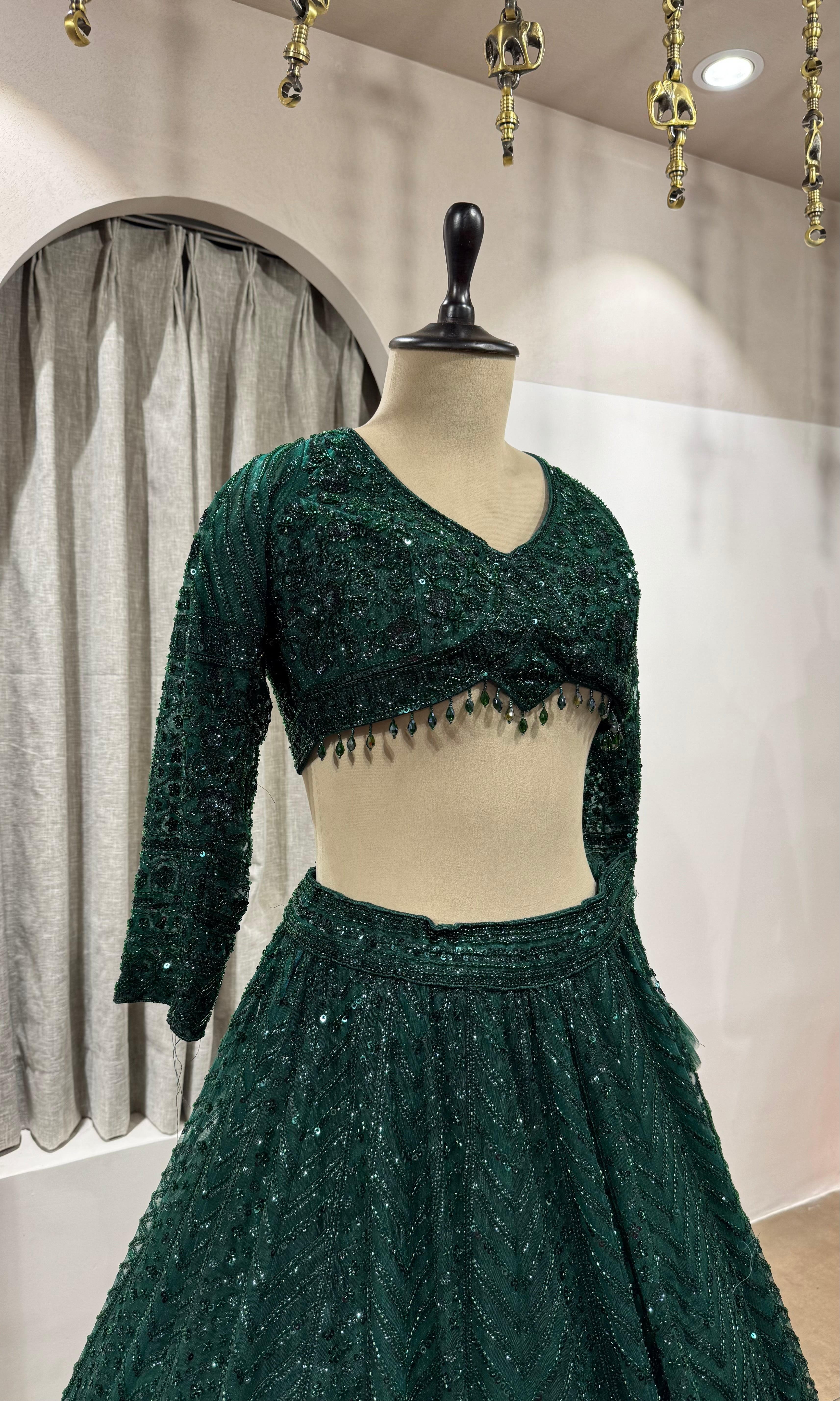 emerald green net lehenga choli