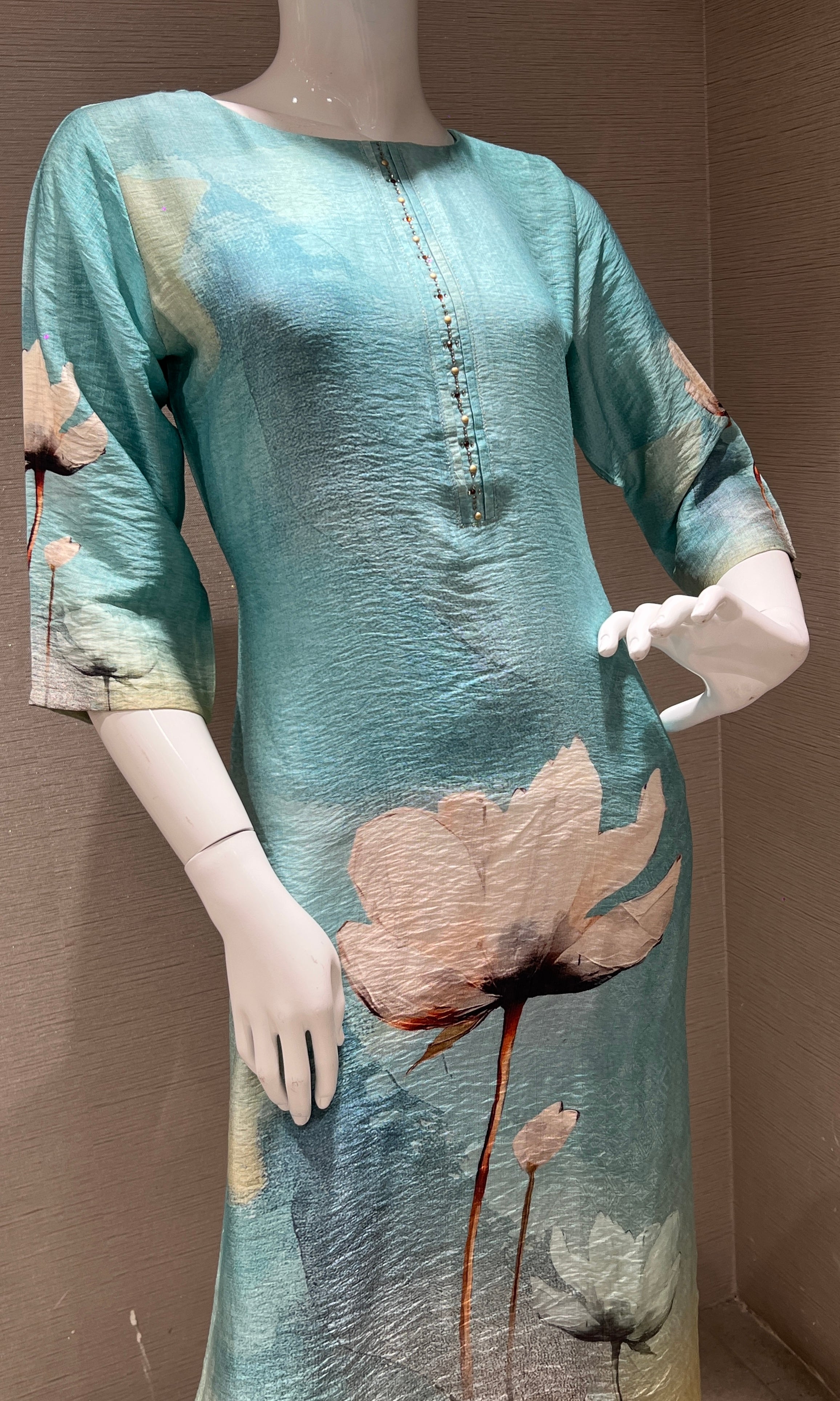 Sea blue kurti top with a floral print