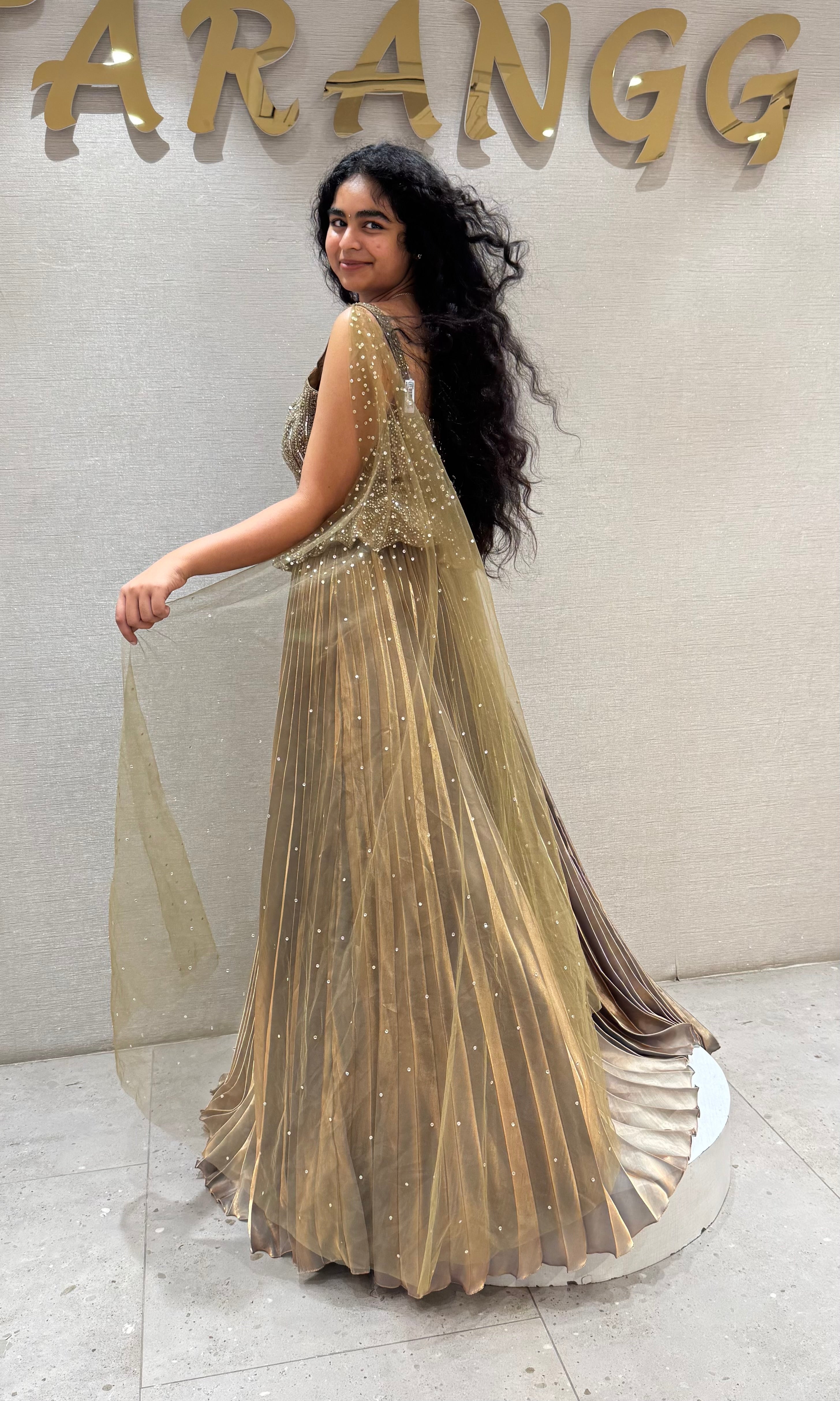 Green Golden peplum gown with cape