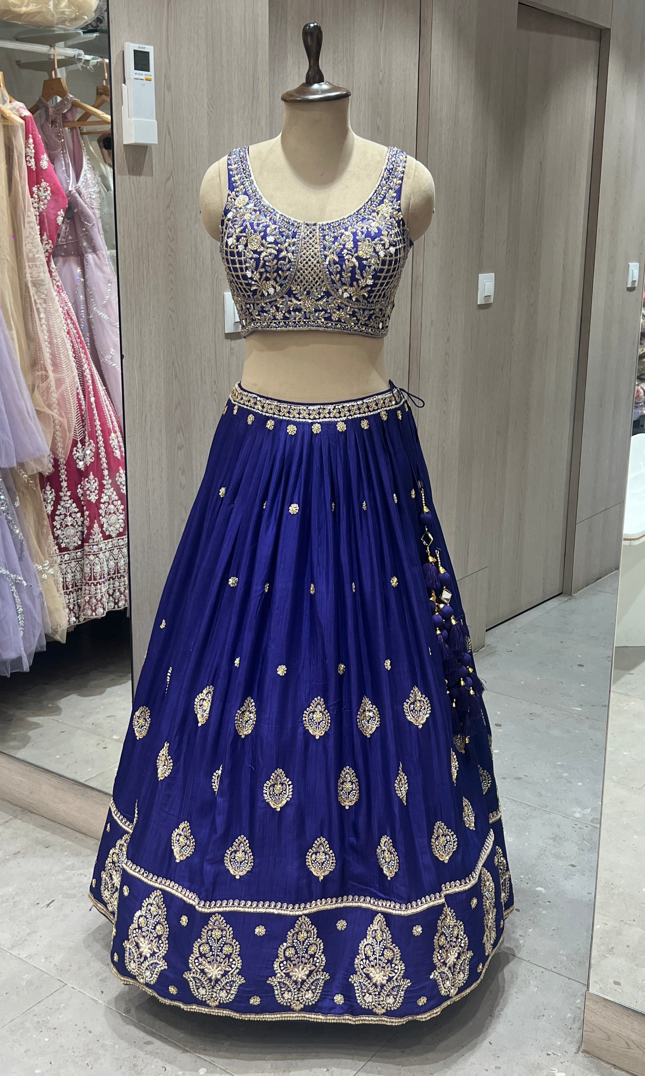 Purple lehenga with gold embroidered work