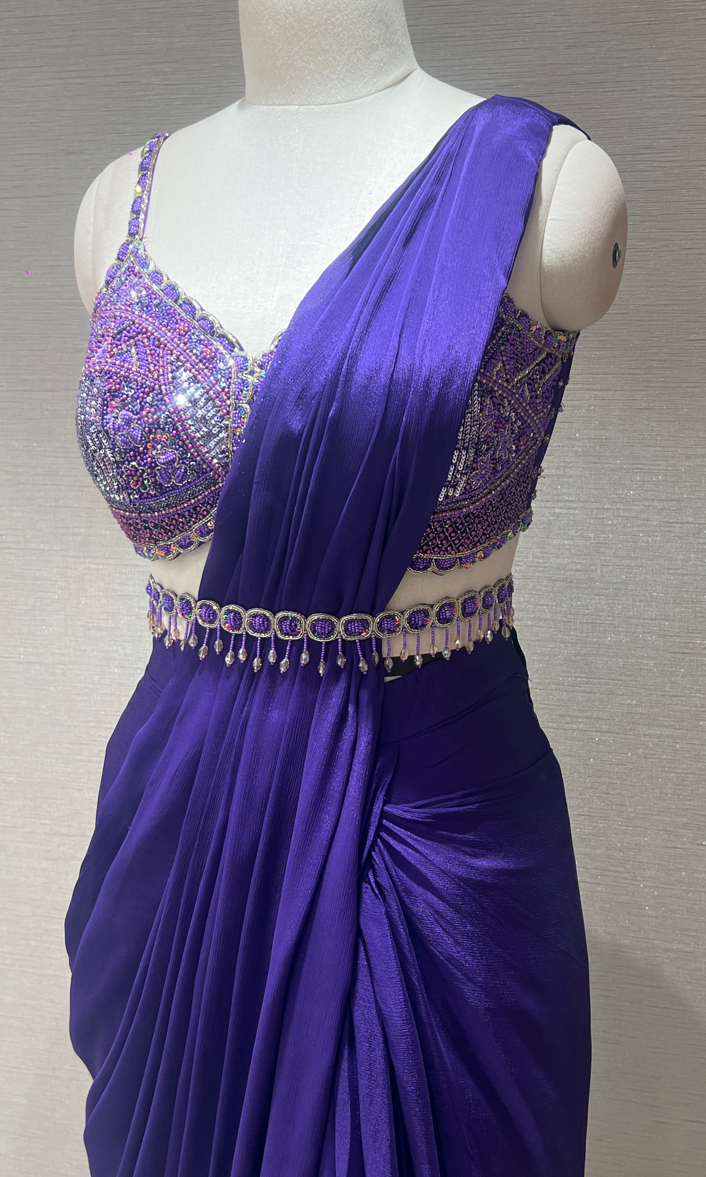 Purple drape saree with embroidered blouse