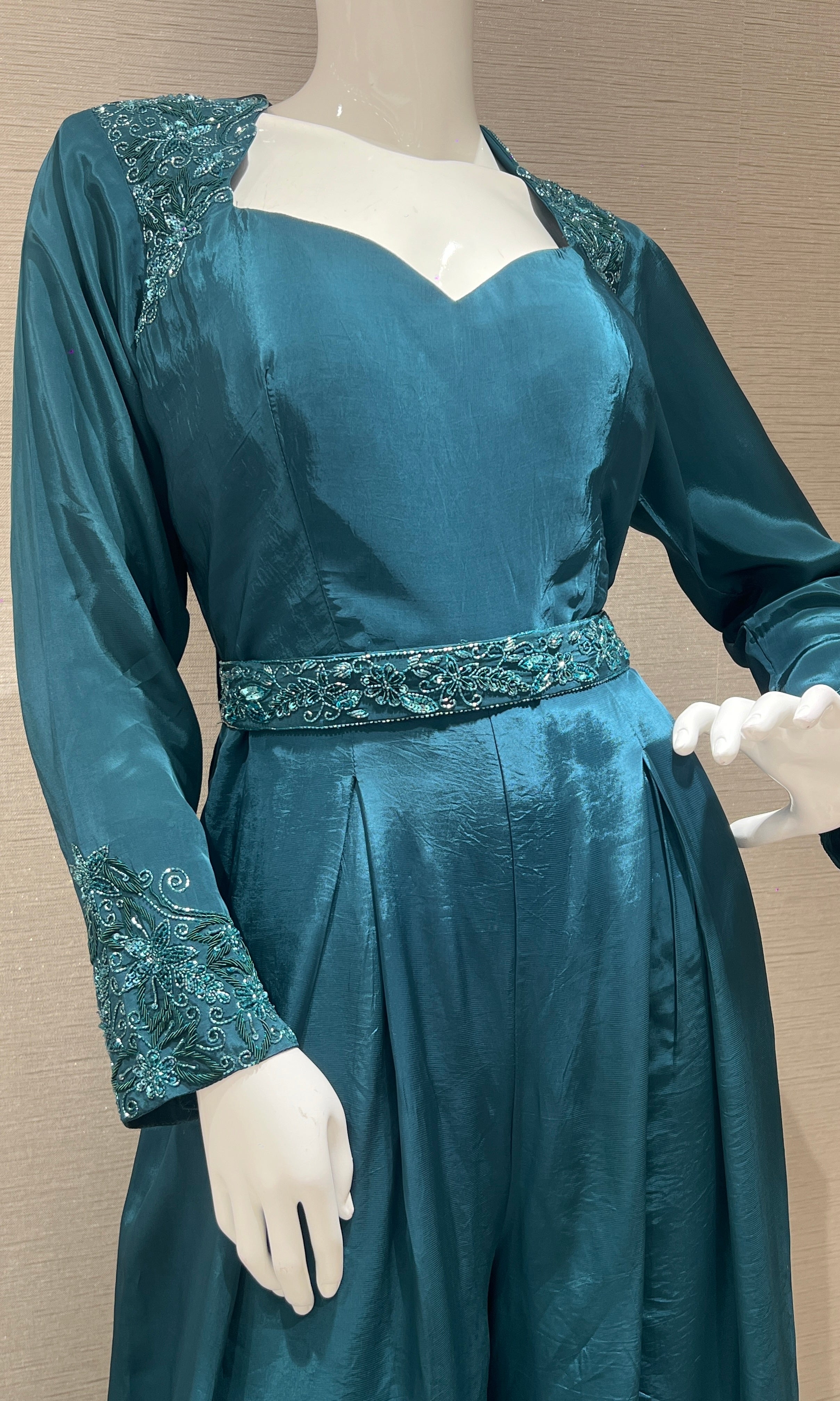 Green jumpsuit with belt