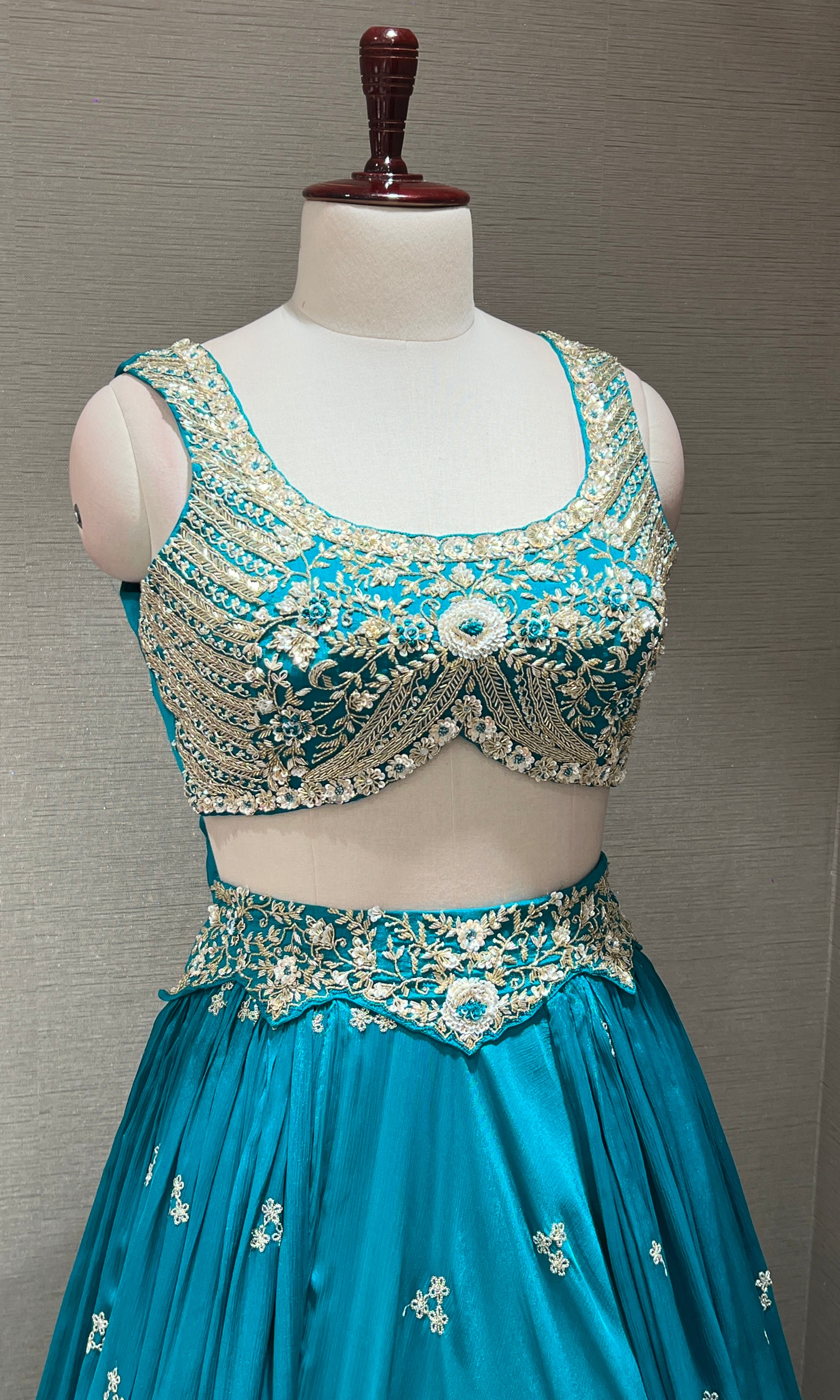 Teal blue gold zari embroidered lehenga
