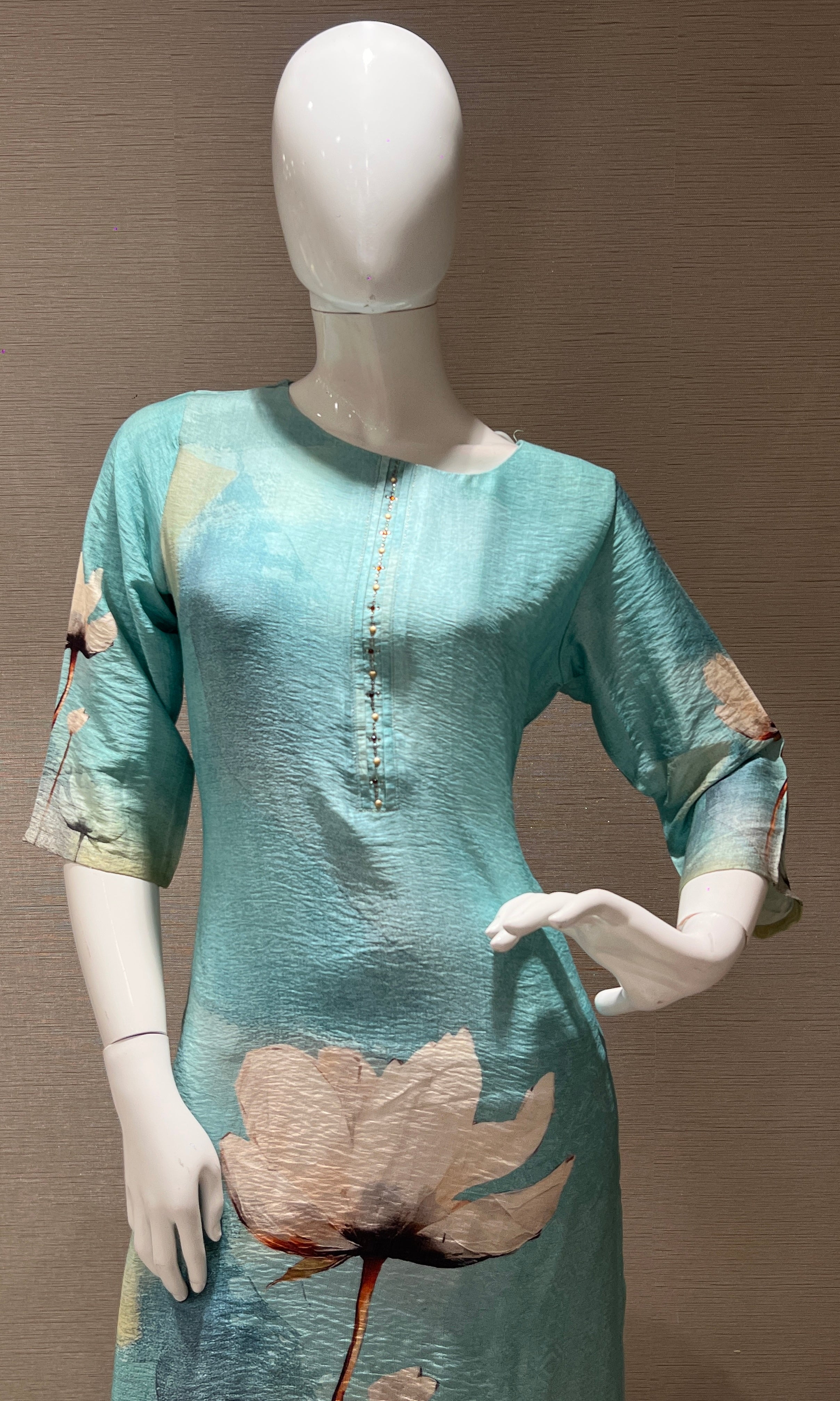 Sea blue kurti top with a floral print