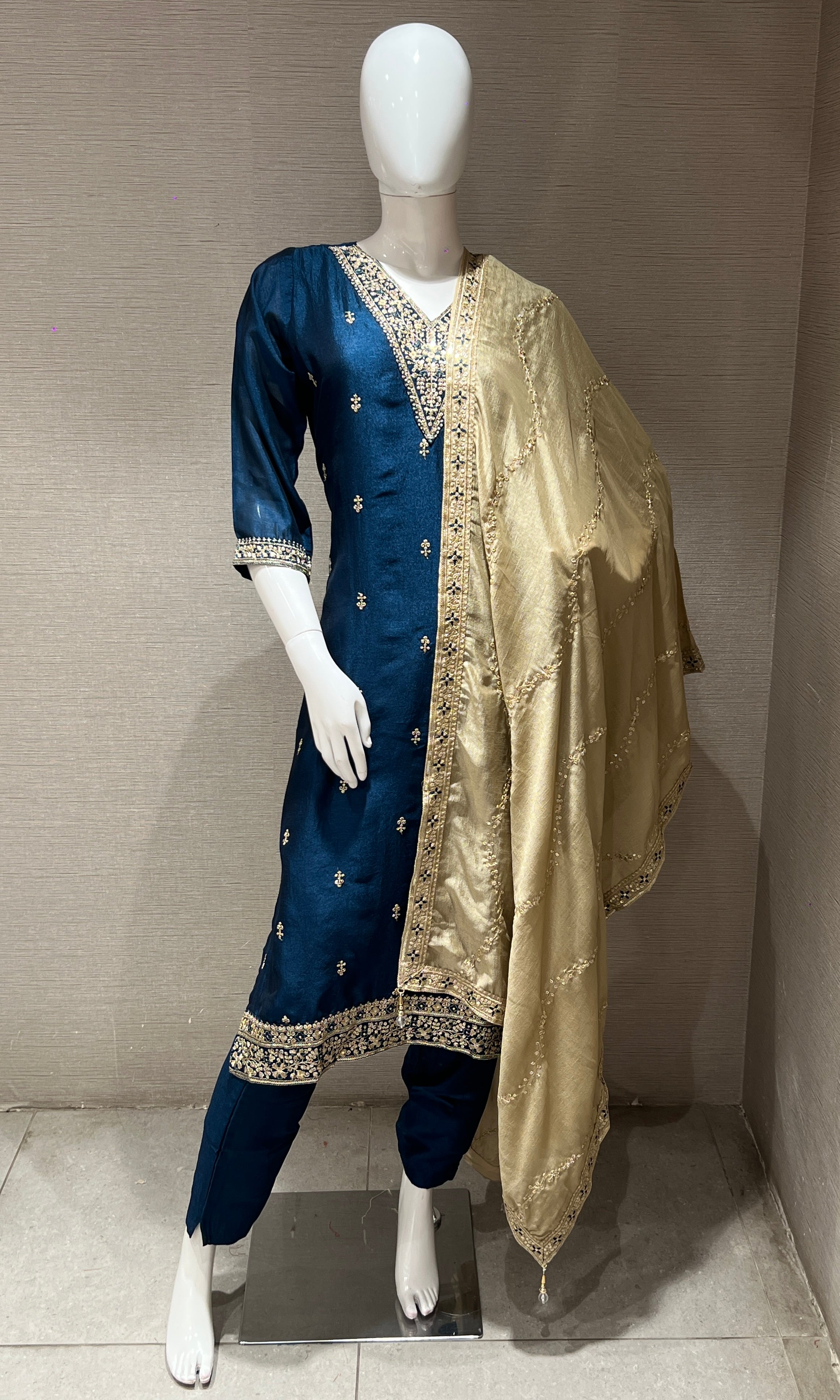 peacock blue kurta set with gold duppatta