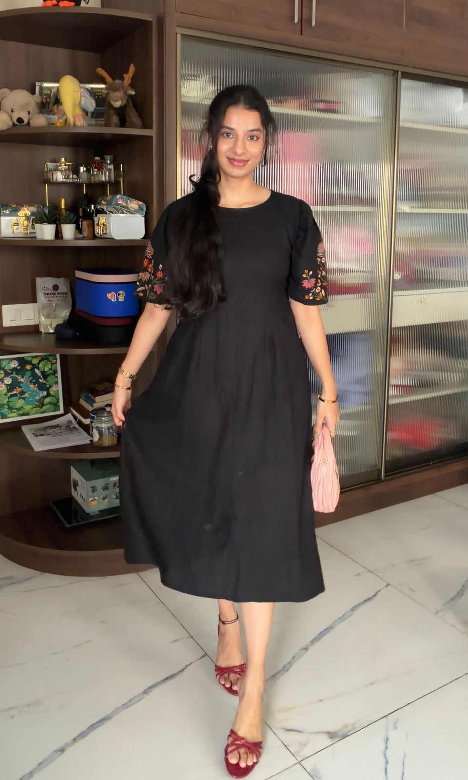 Black dress with embroidered puff sleeves