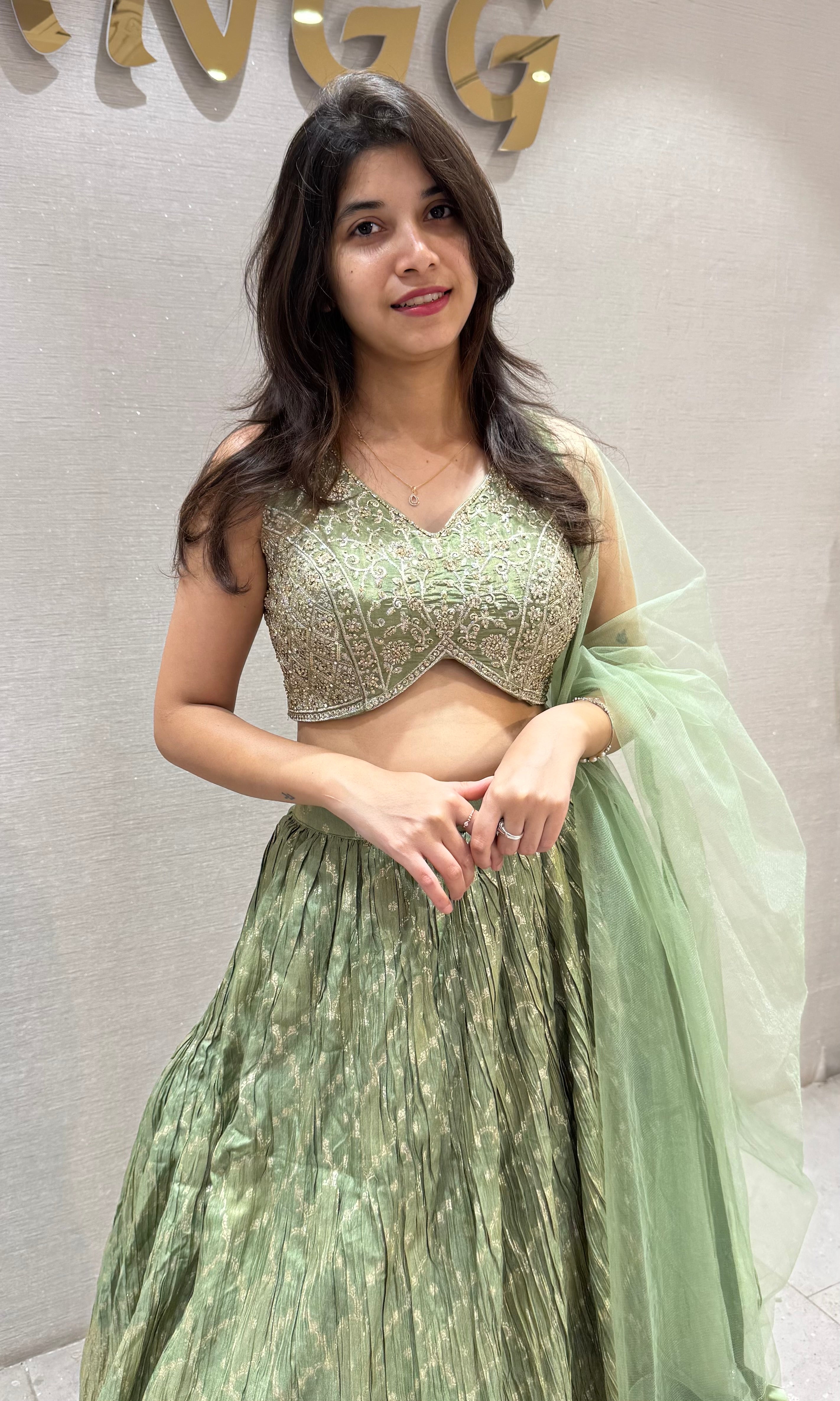 Pista Green Embroidered Net Lehenga Choli