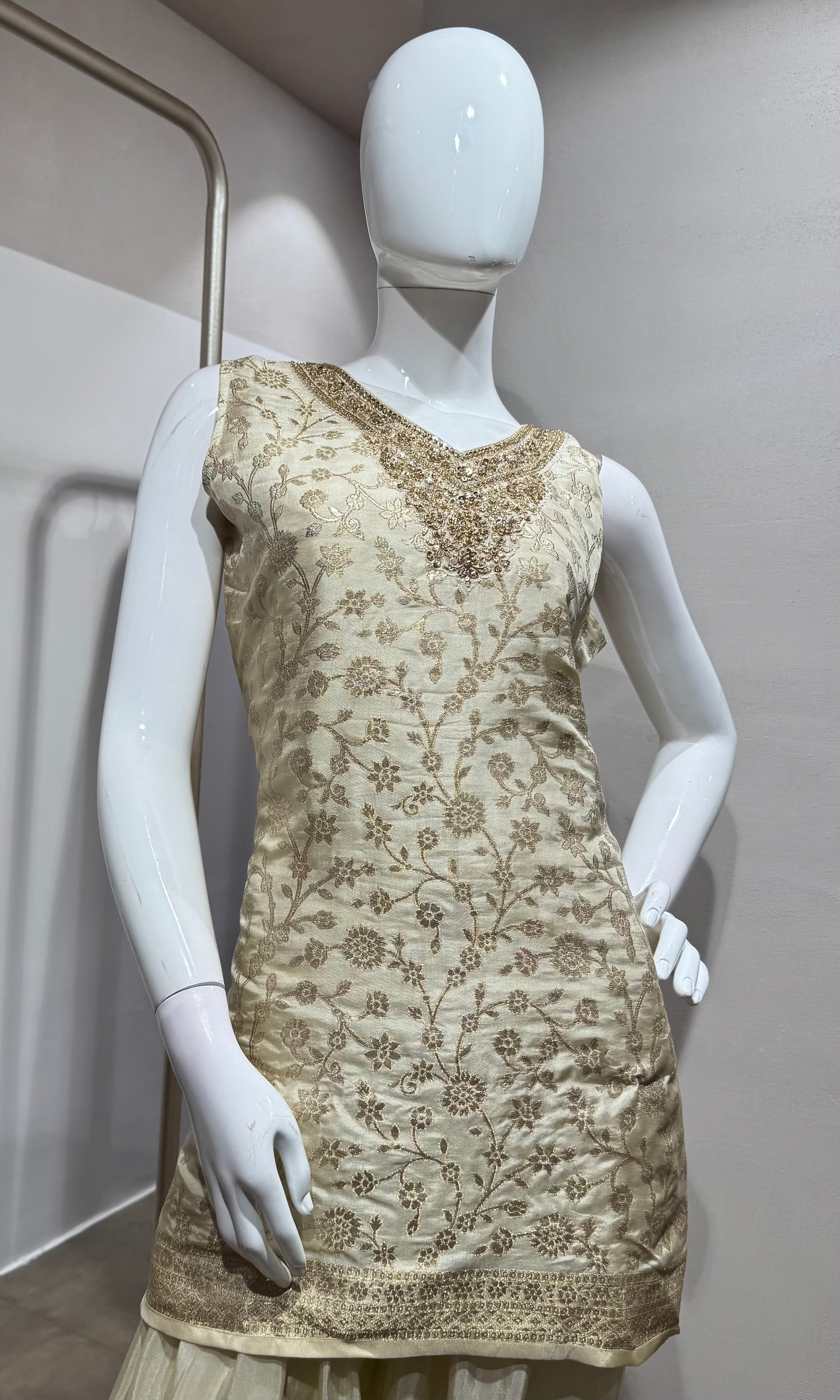 half white kurta set with pants and a dupatta