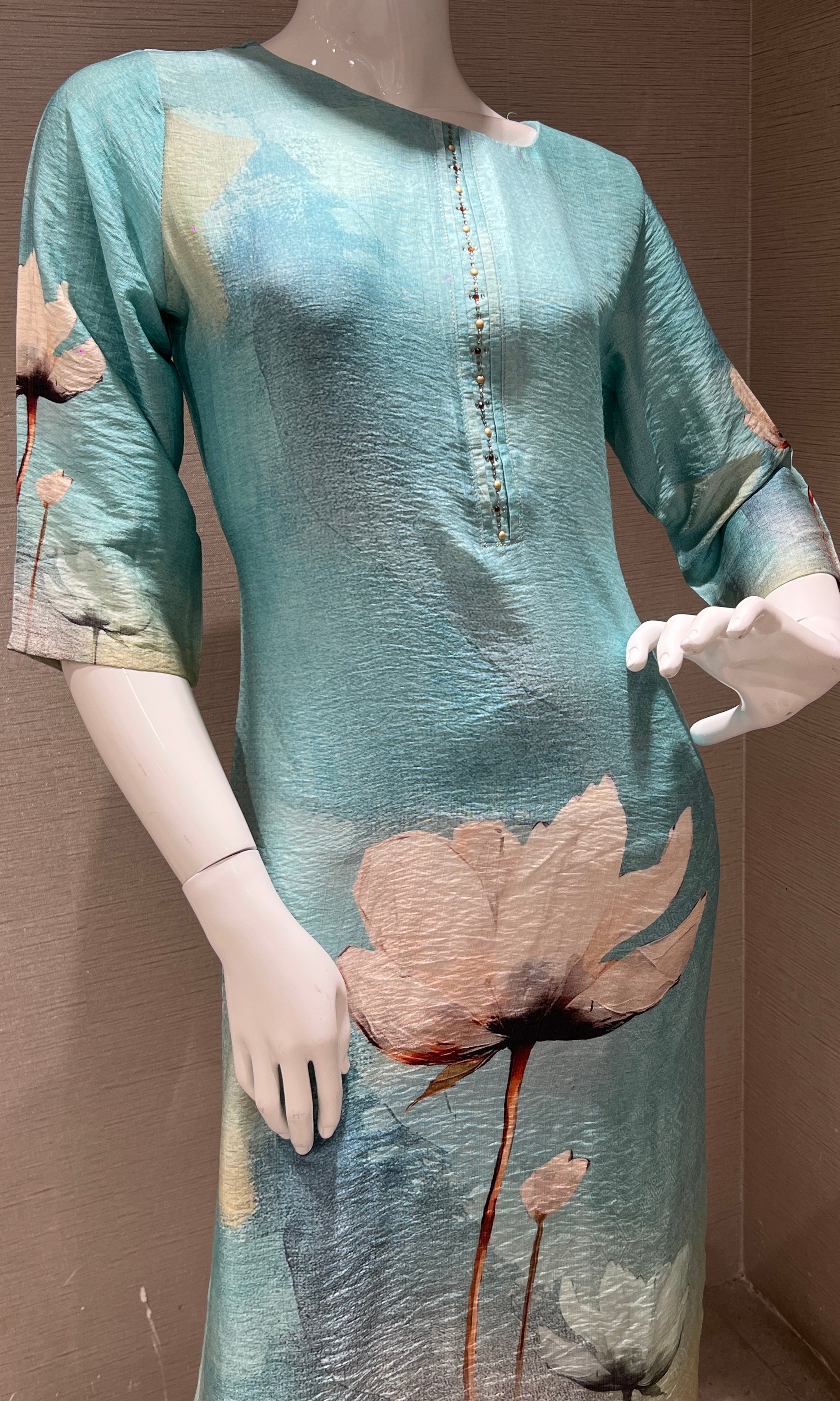 Sea blue kurti top with a floral print