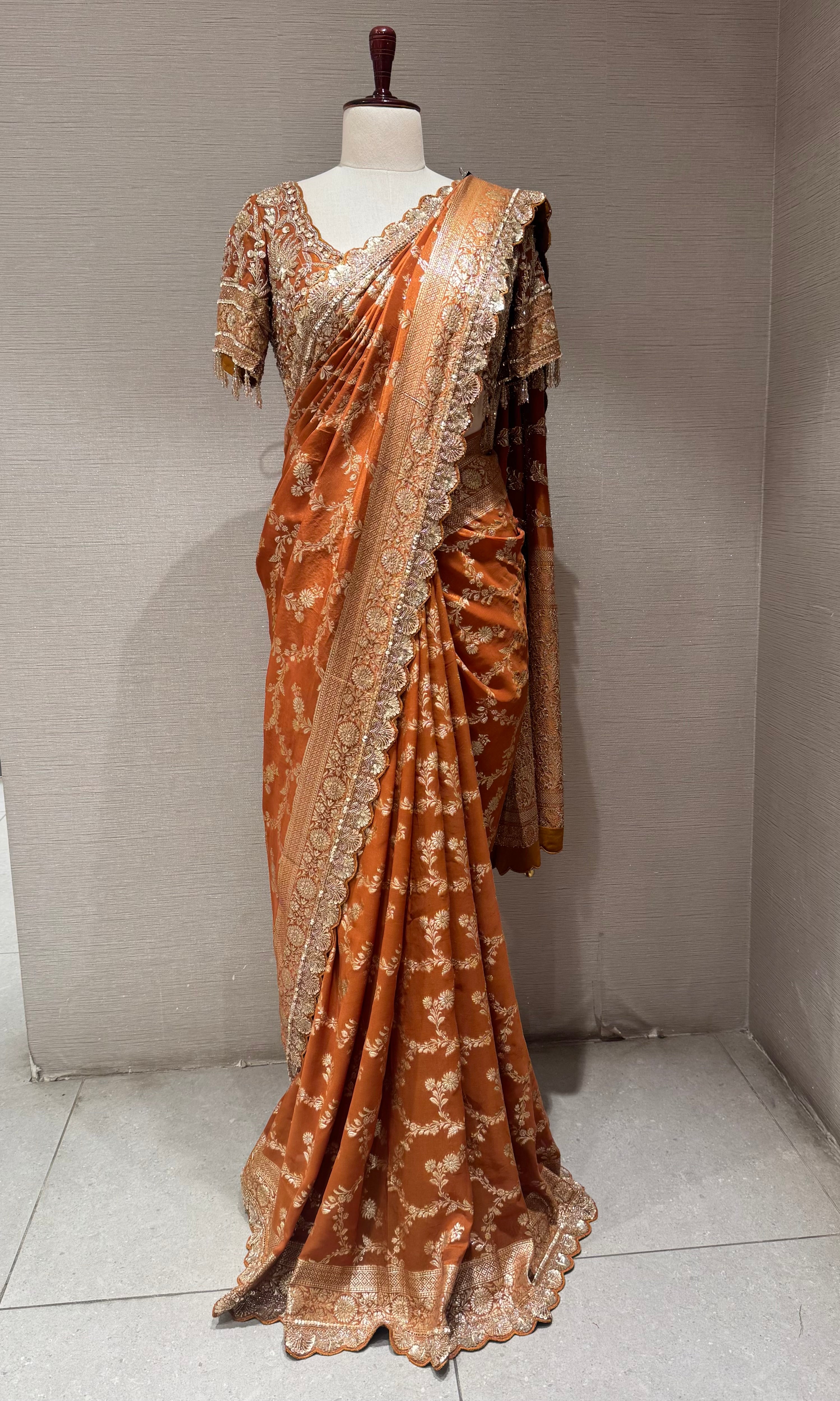 Brown designer saree with embroidered blouse