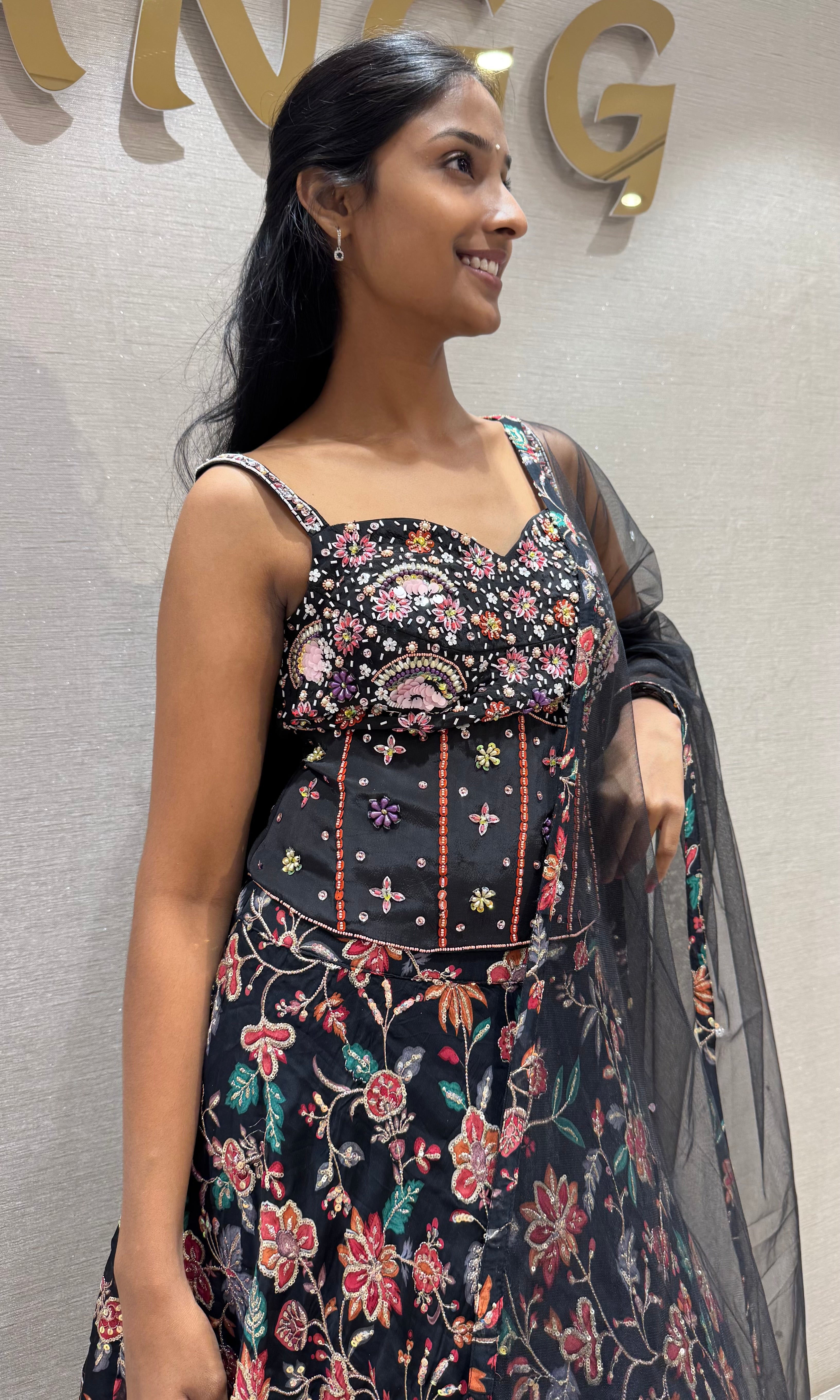 black floral printed lehenga set with corset blouse