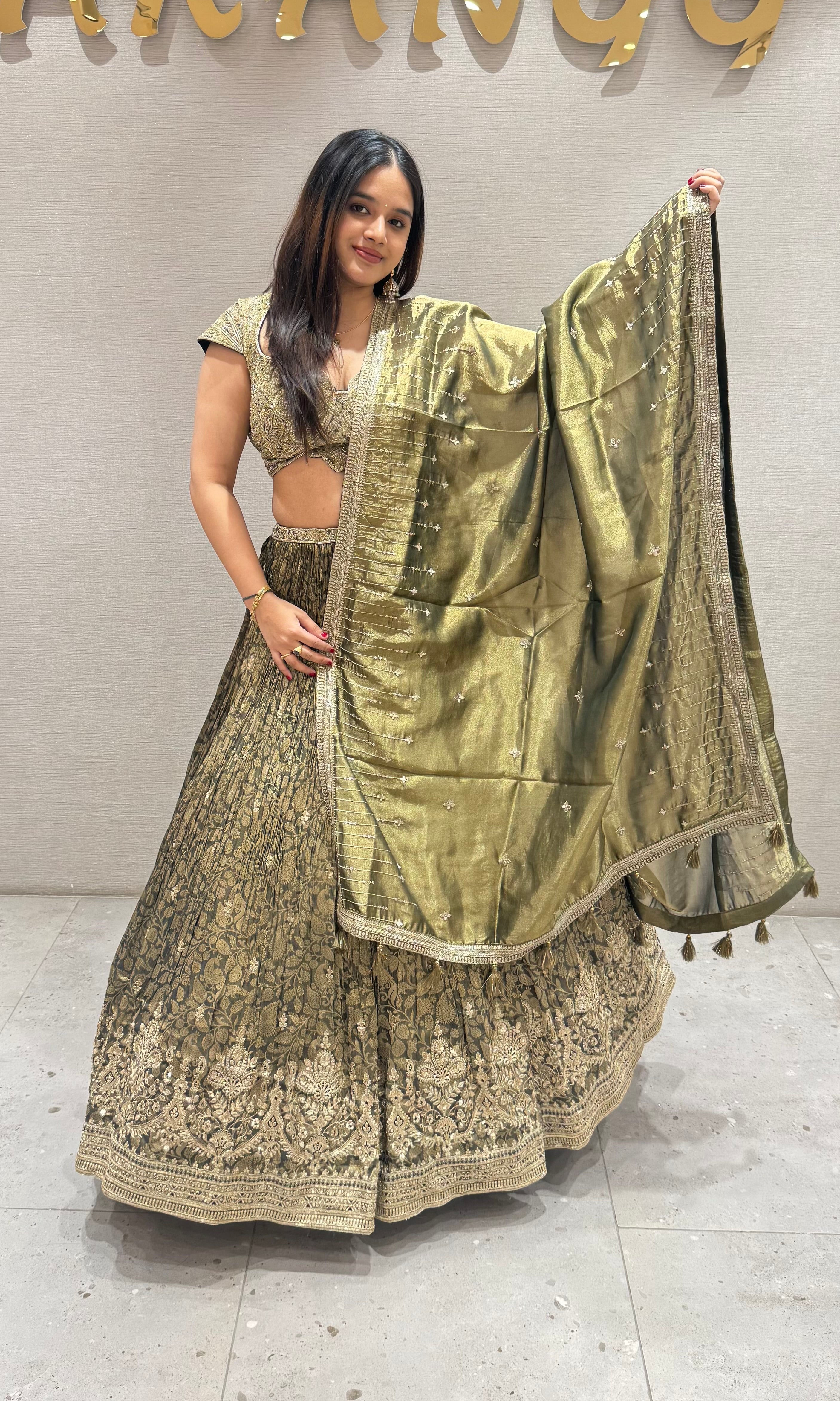 Emerald green crushed lehenga with tissue gold