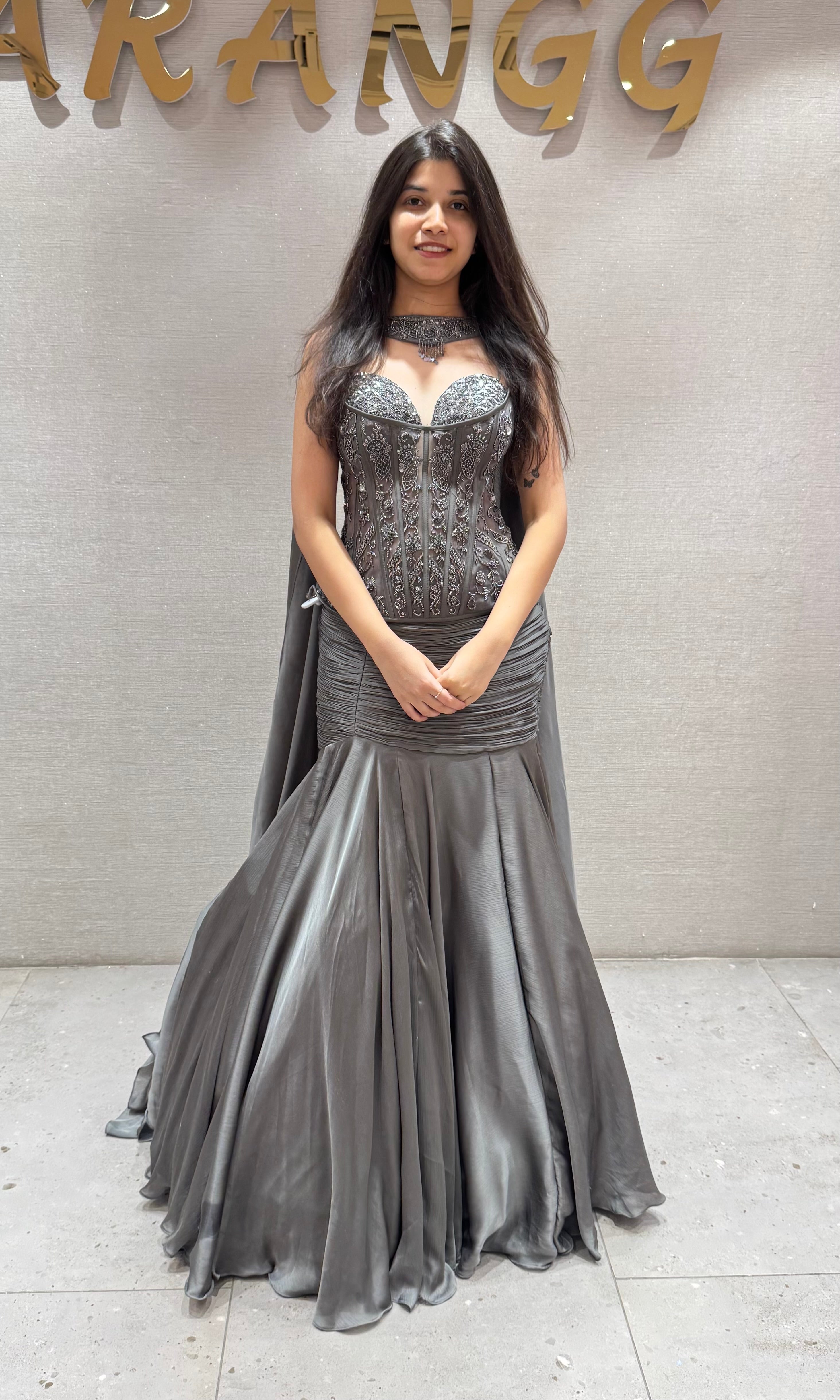 Grey ruffled lehenga with corset blouse