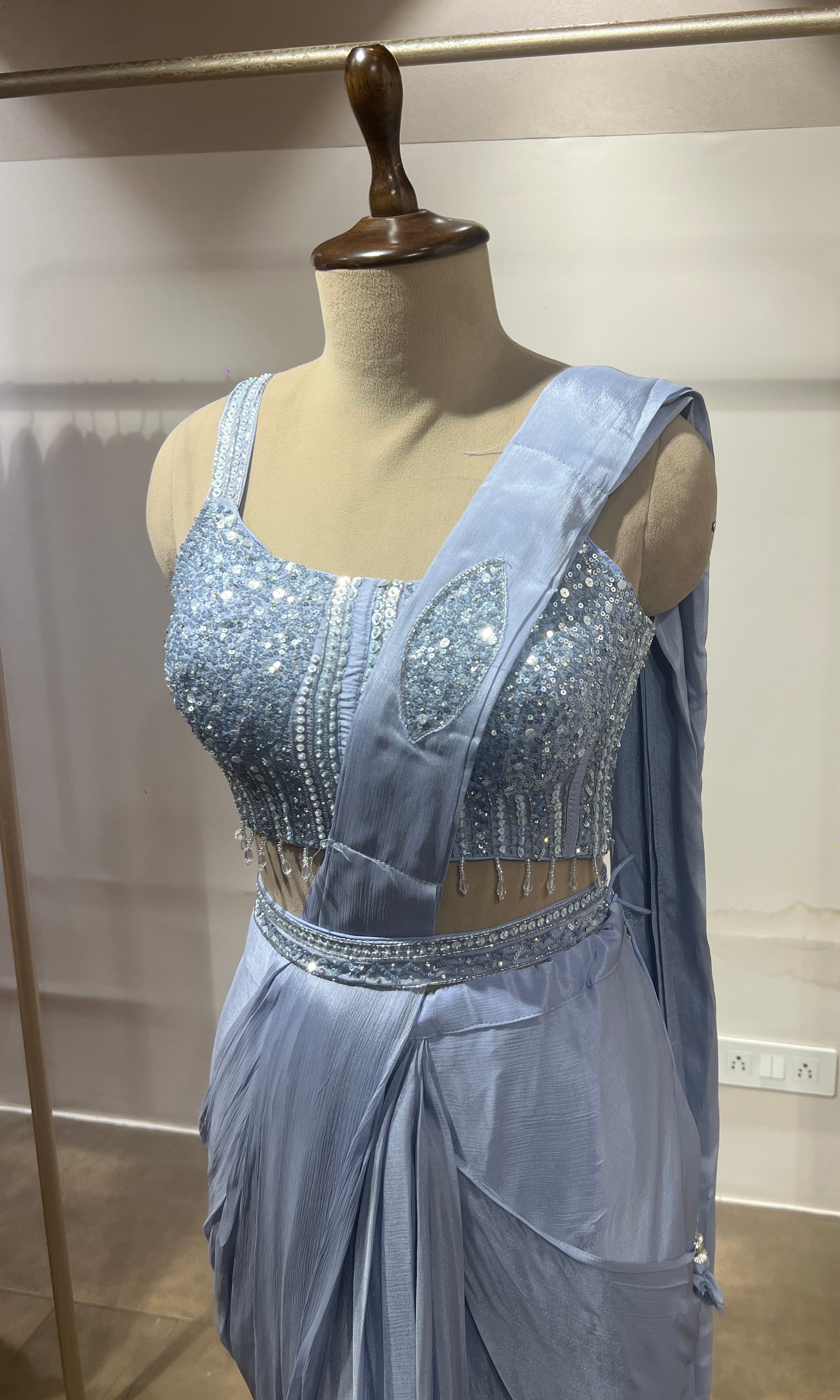 Blue satin drape saree with embellished blouse