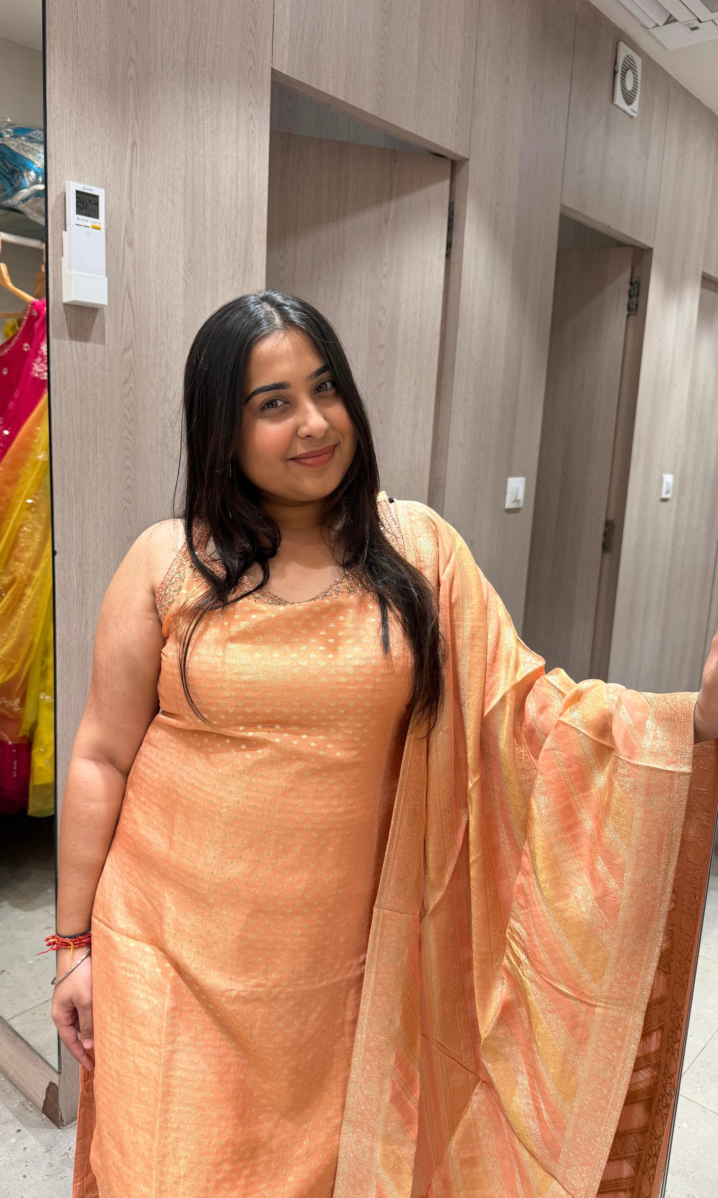 peach and gold Banarasi kurta set
