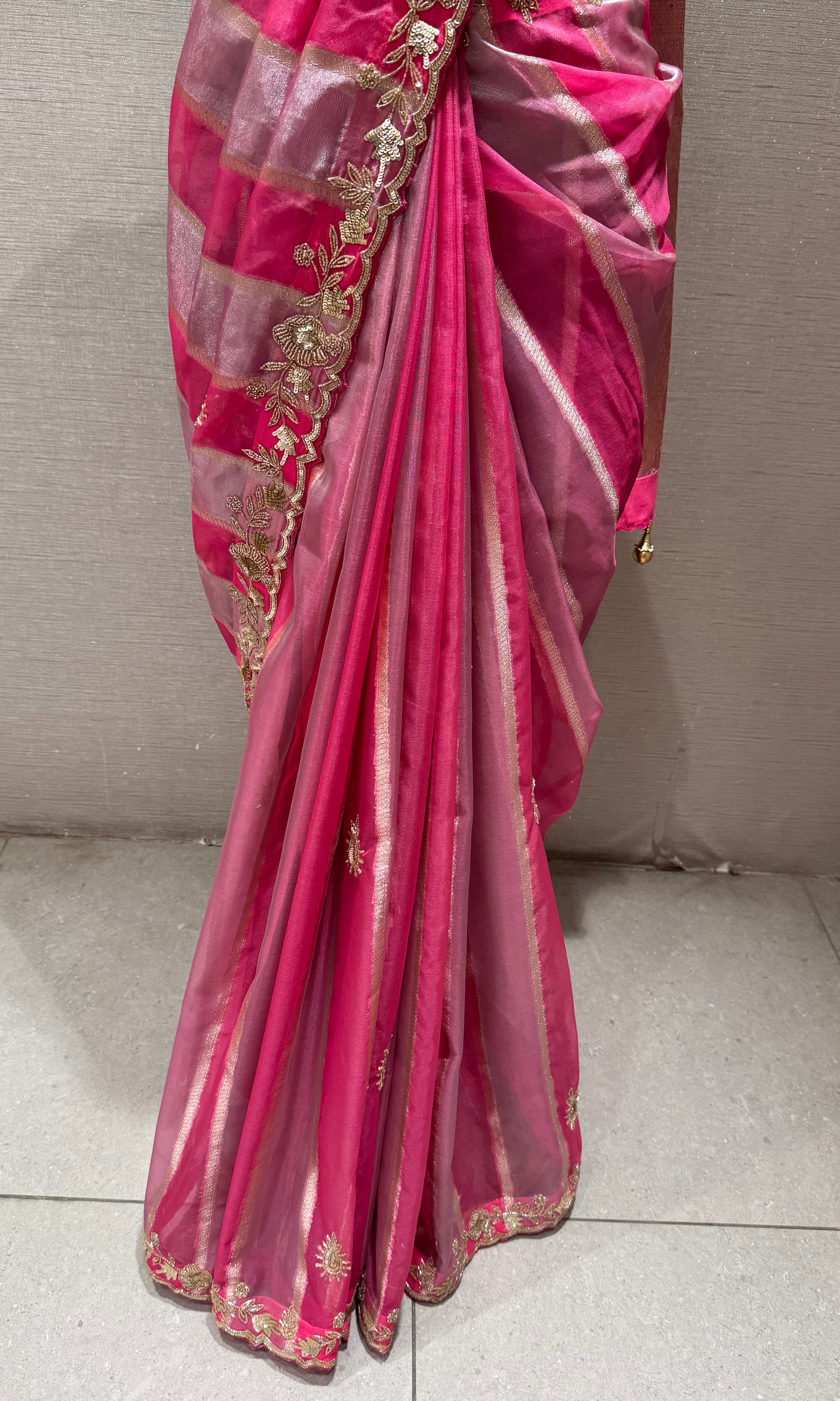 pink leheriya tissue saree with embellished blouse
