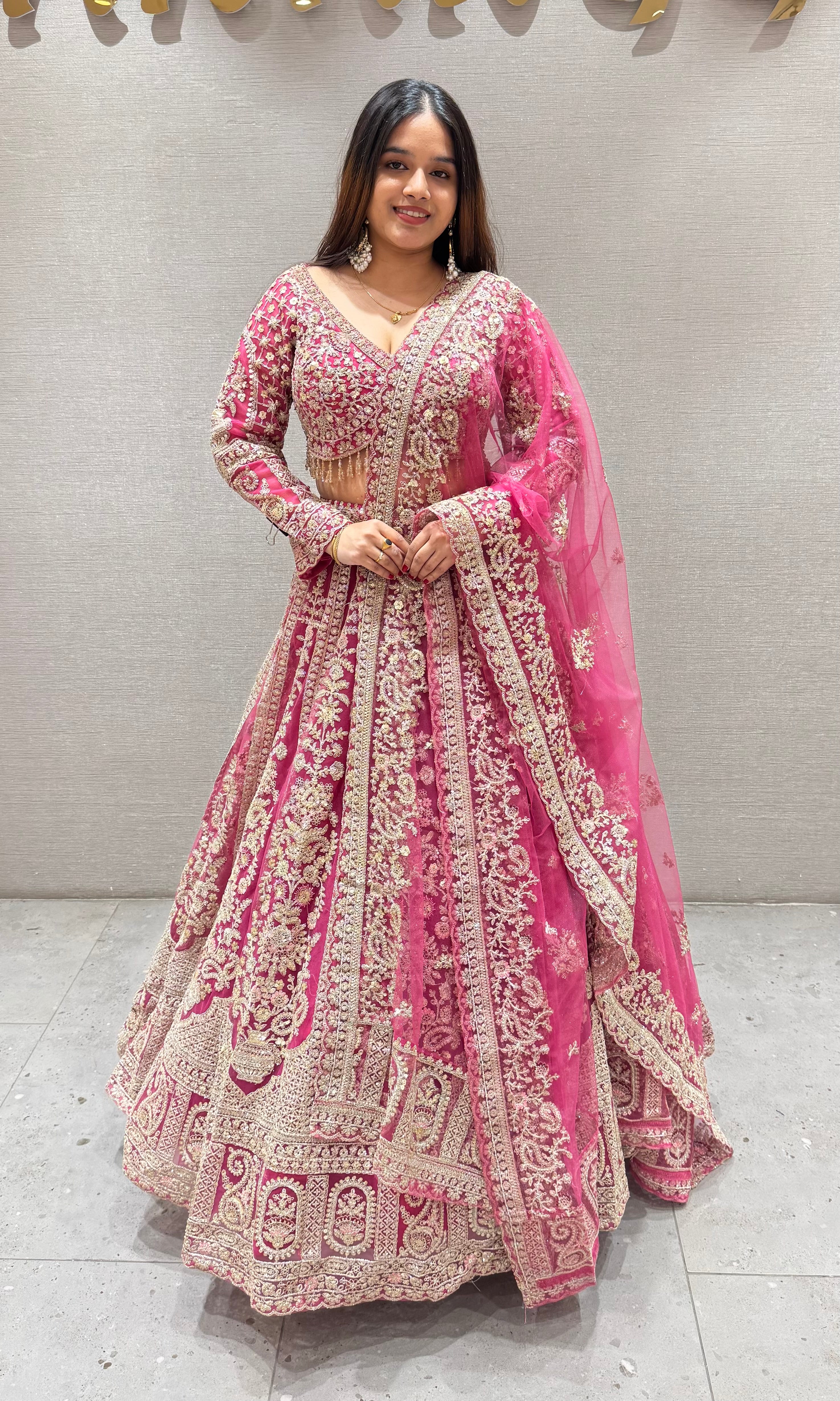 Pink lehenga with golden embroidery
