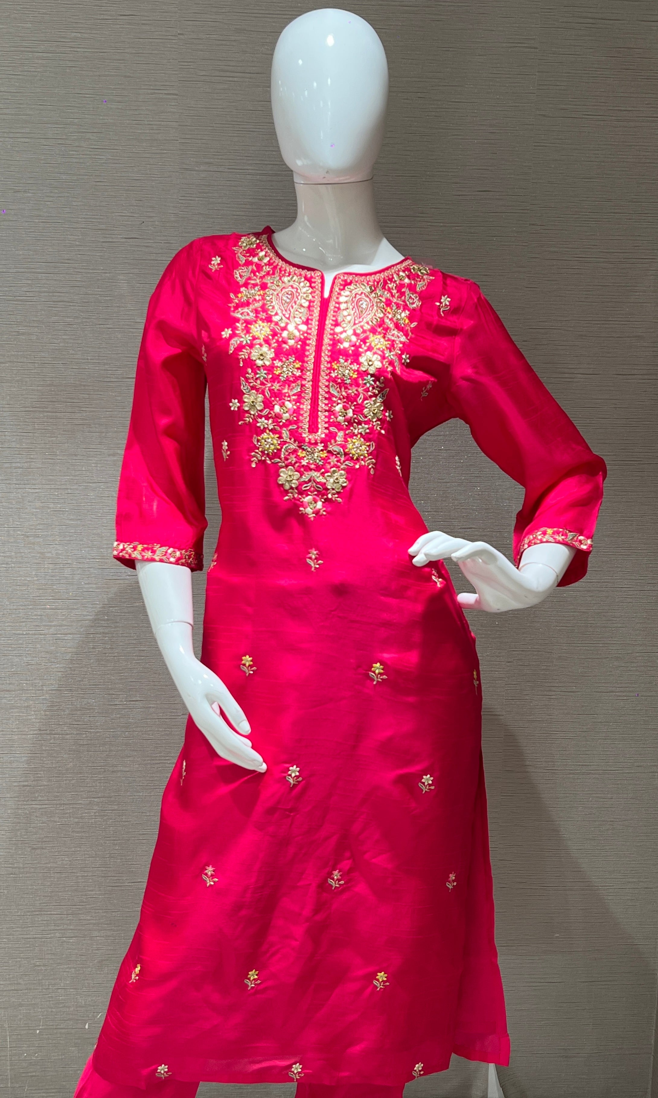 Pink kurta set with a yellow dupatta