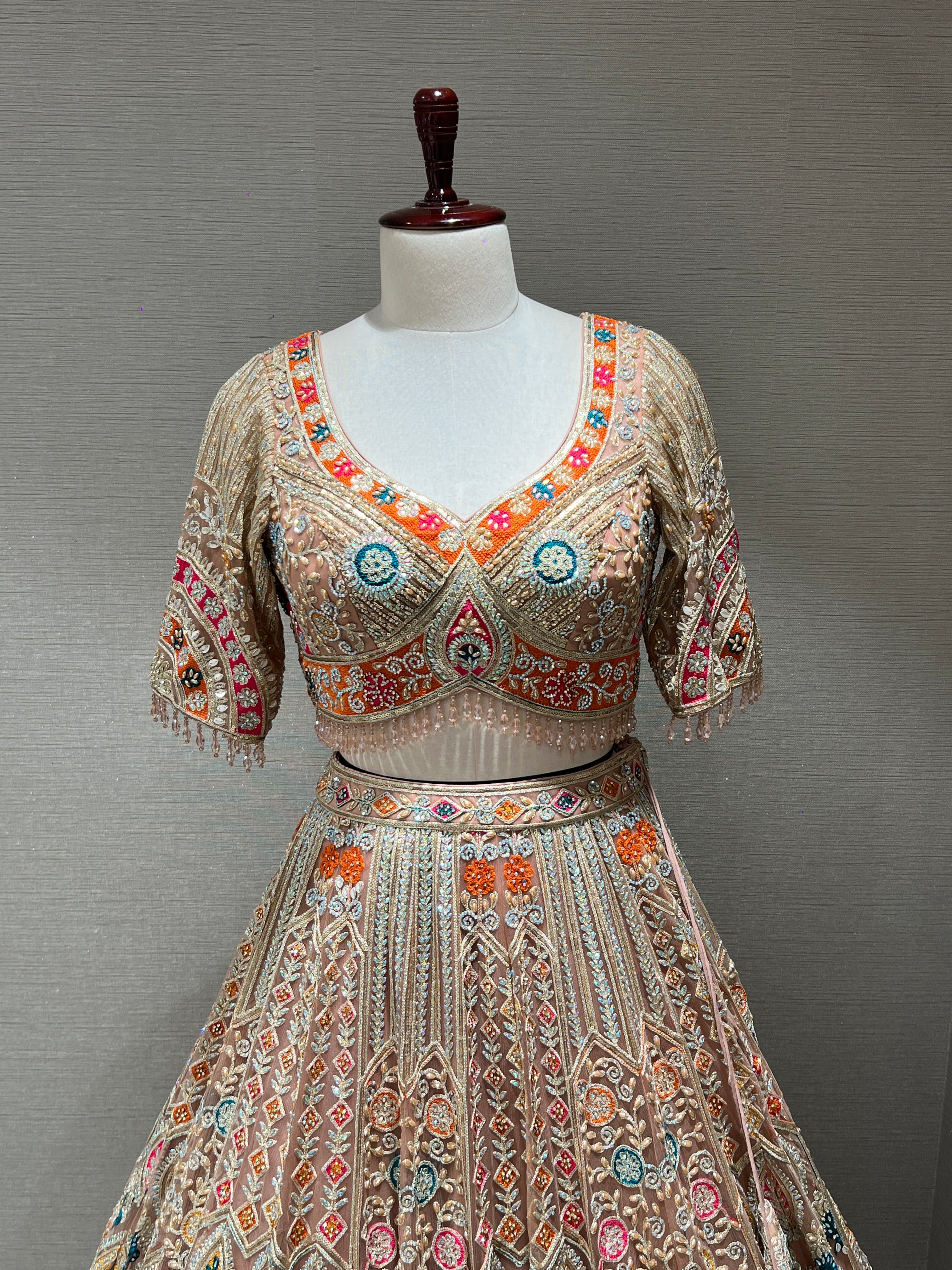 Peach Lehenga with Sequin and stone embellishments