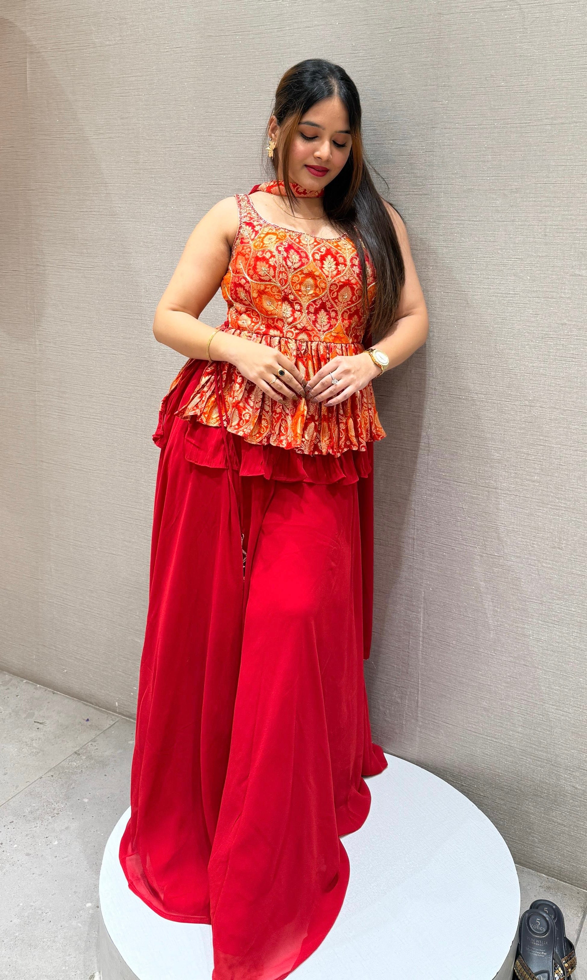 Red palazzo set with peplum top