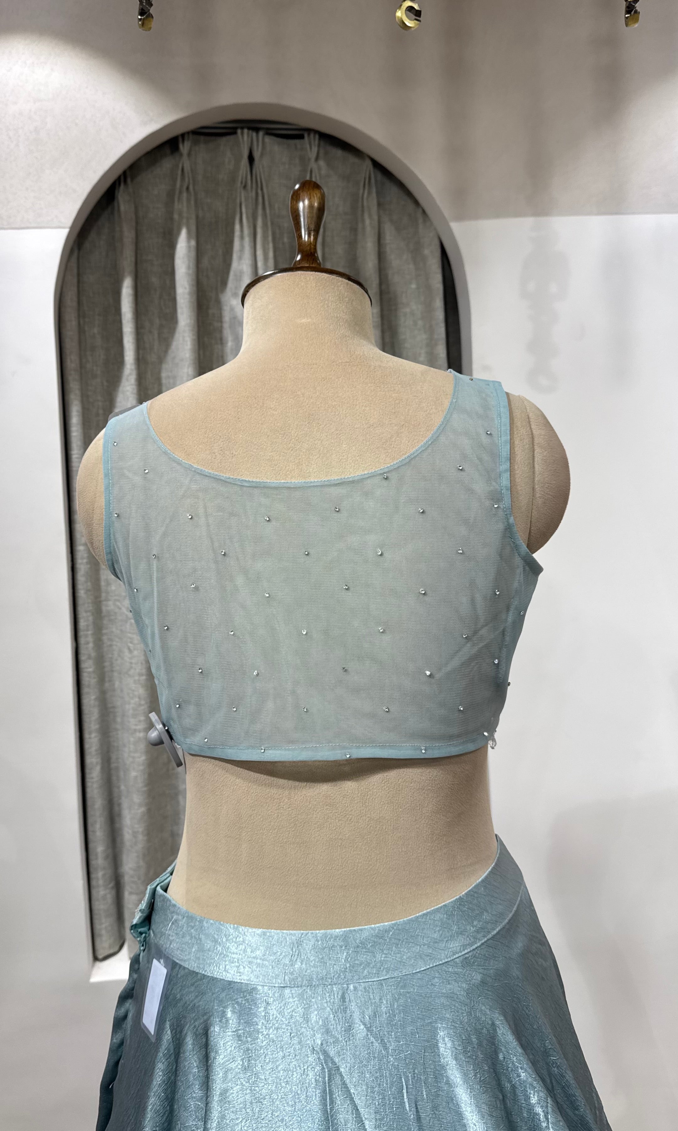Sea green Lehenga with embroidered corset blouse