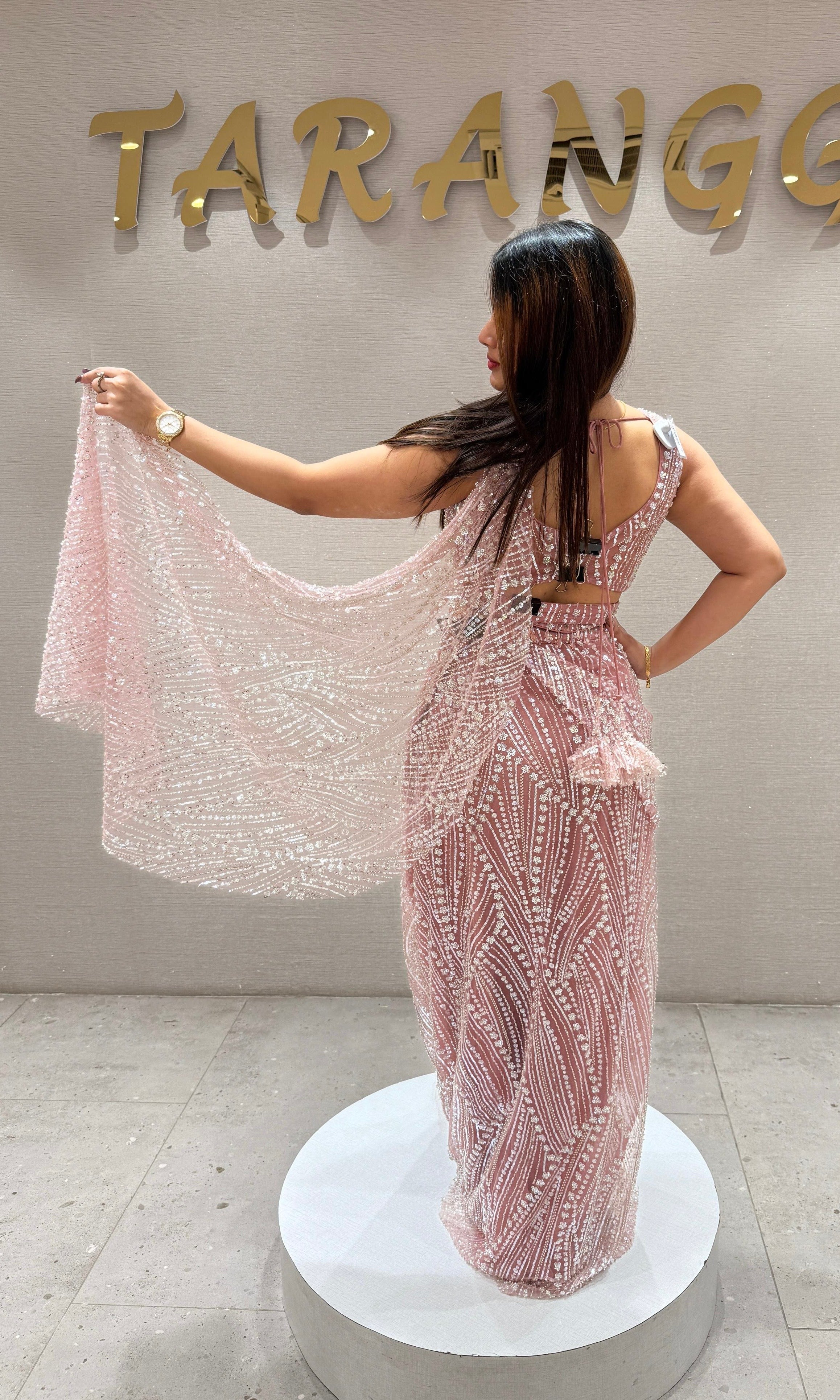 Baby pink sequin embroidered drape saree