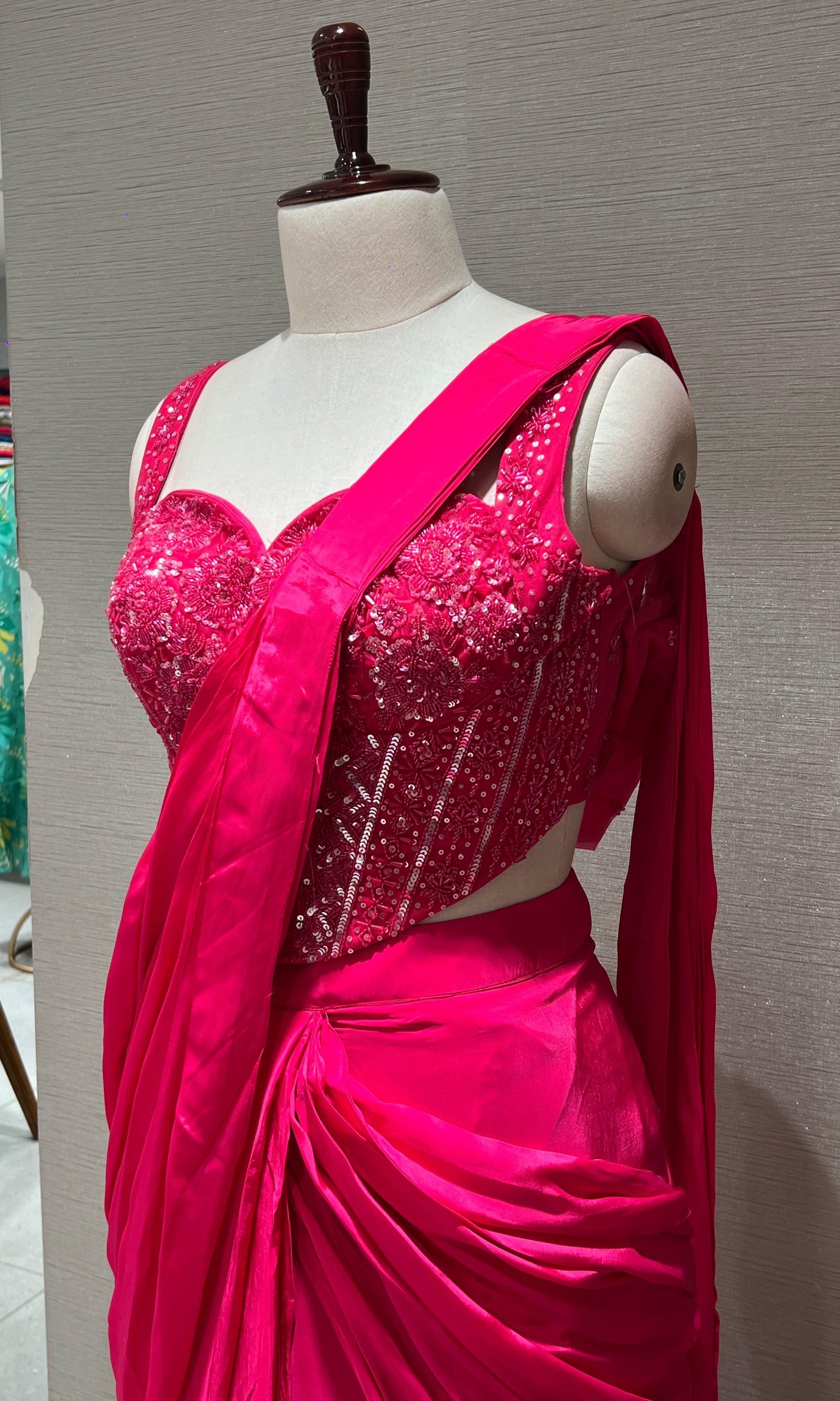 Pink drape saree with corset blouse