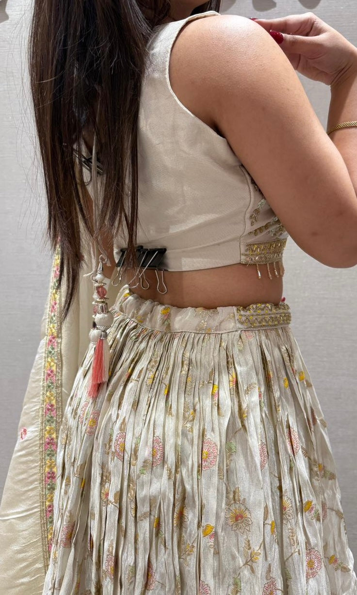 Pearl white lehenga with gold embroidered