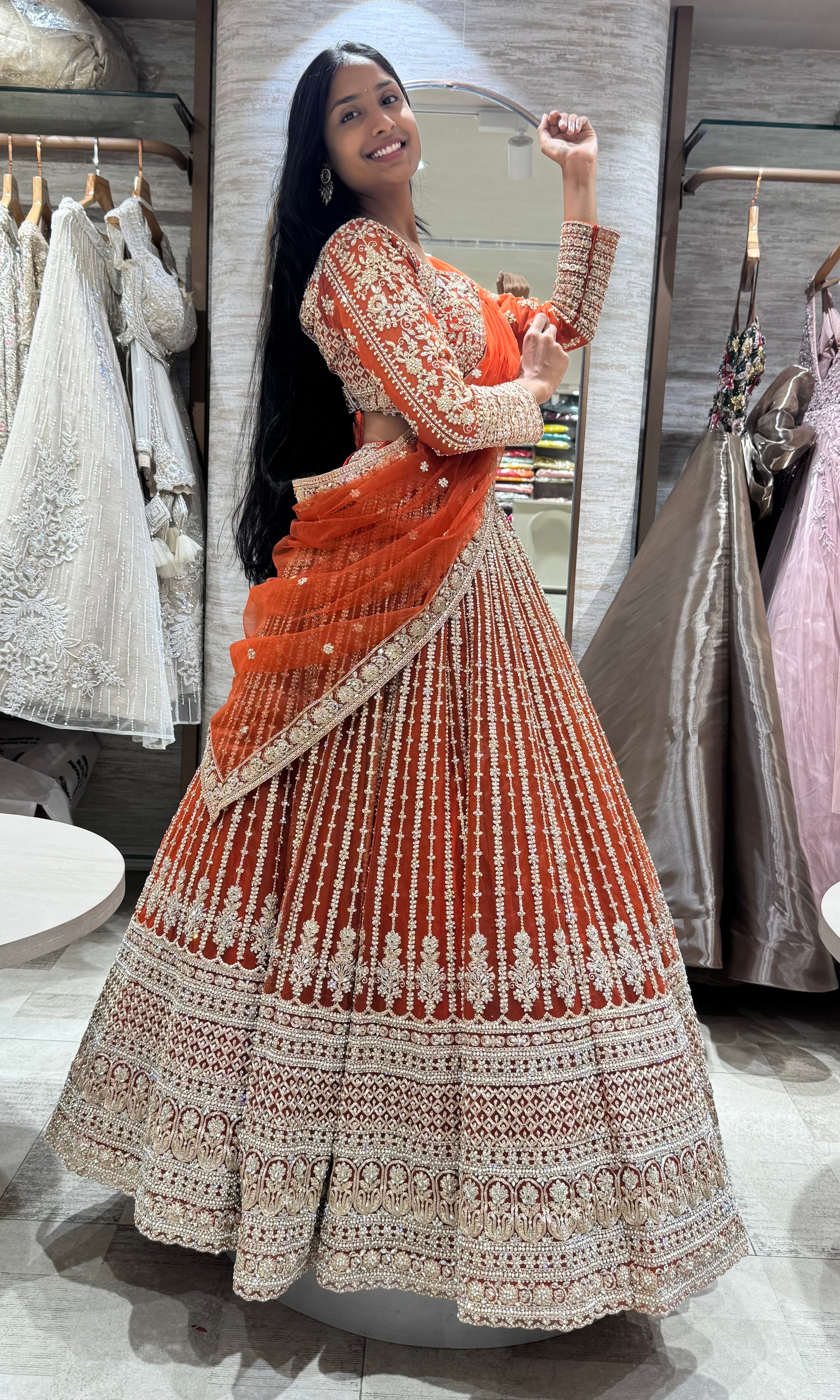 rust and white intricate embroidery lehenga