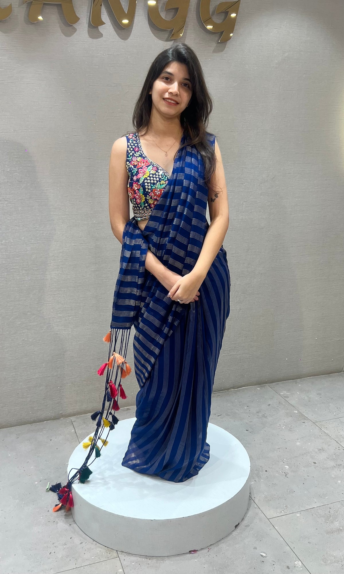 blue and silver striped Drape saree with intricate blouse