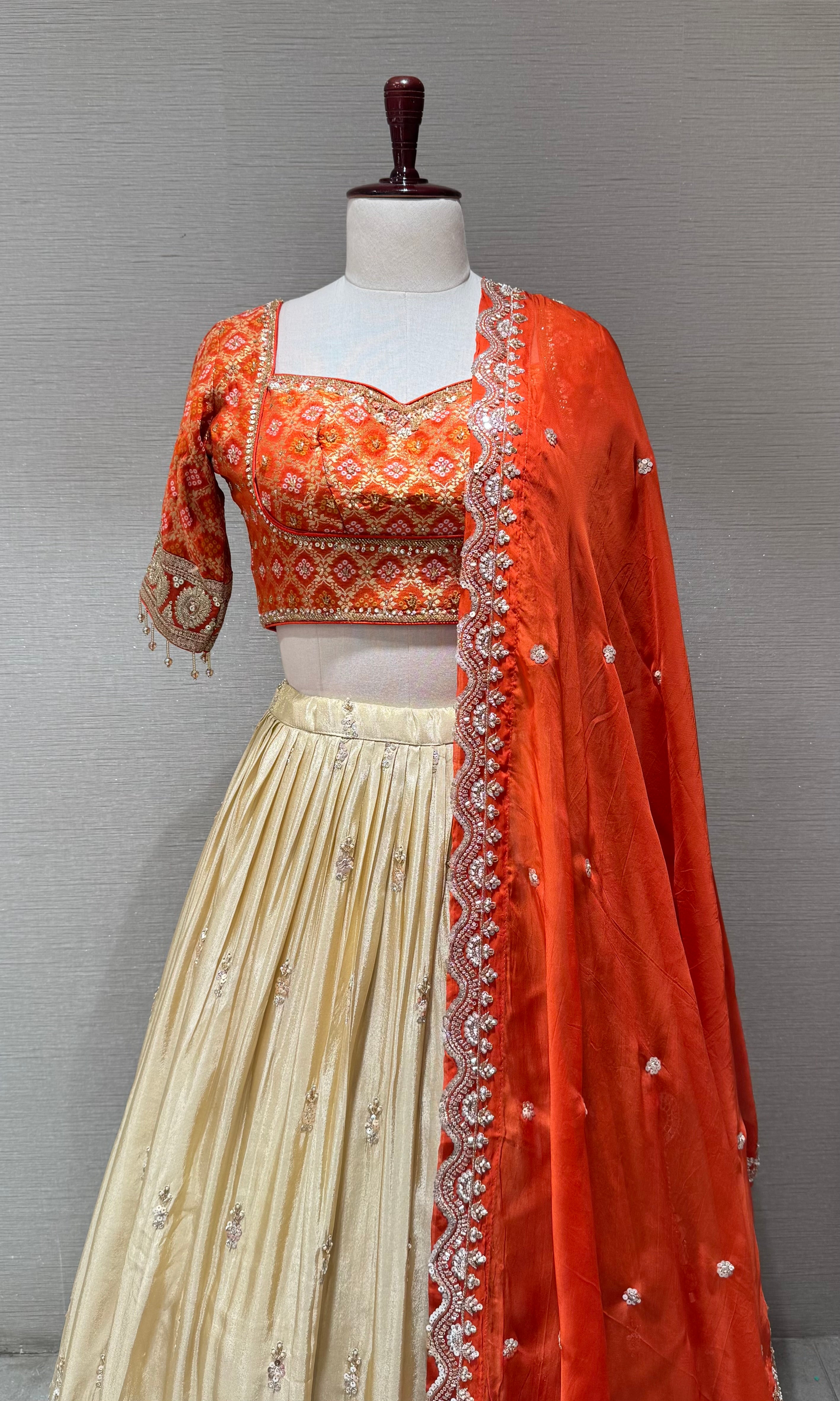 radience Orange and Champagne Silk Lehenga Set