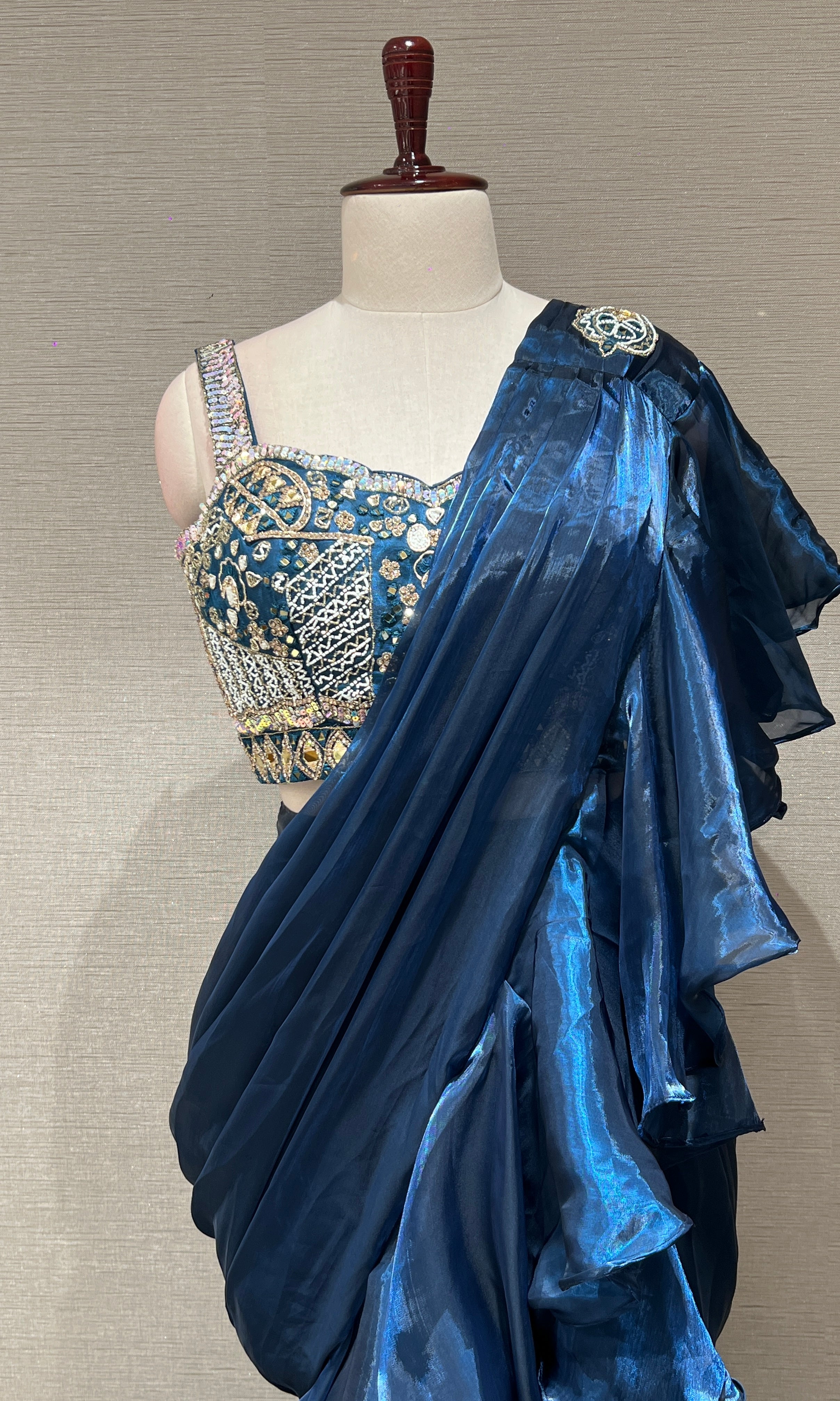 metallic blue drape saree with ruffles