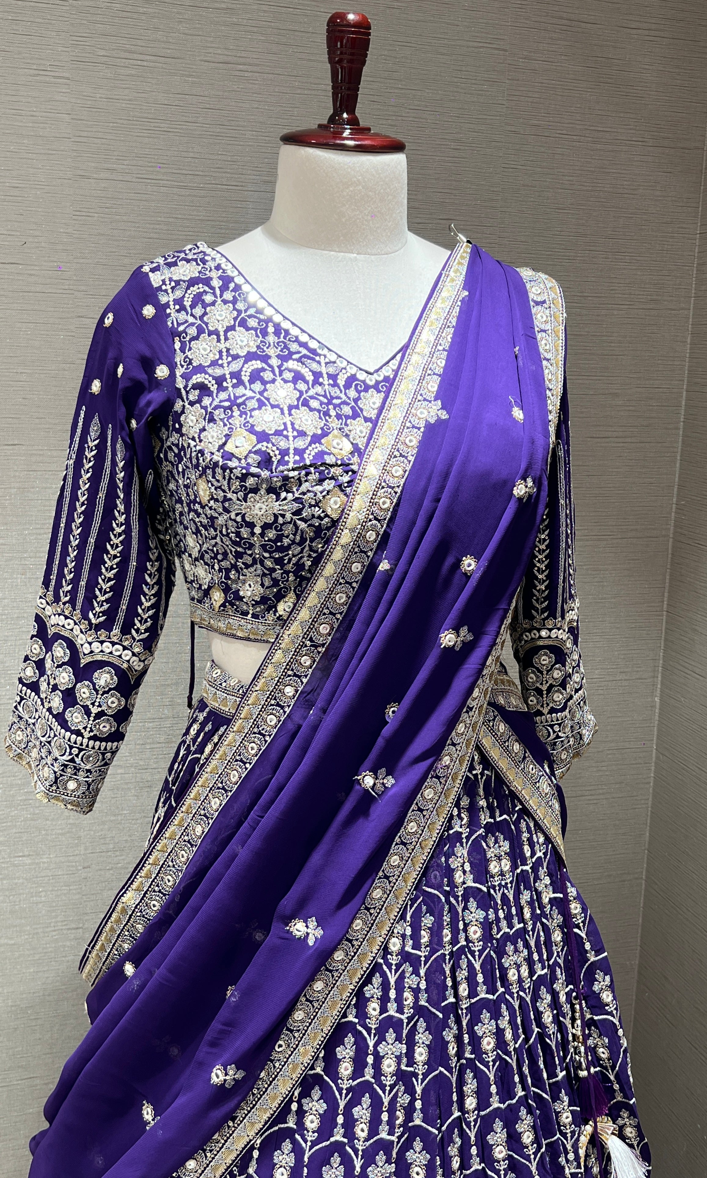 Purple Lehenga with intricate embroidery