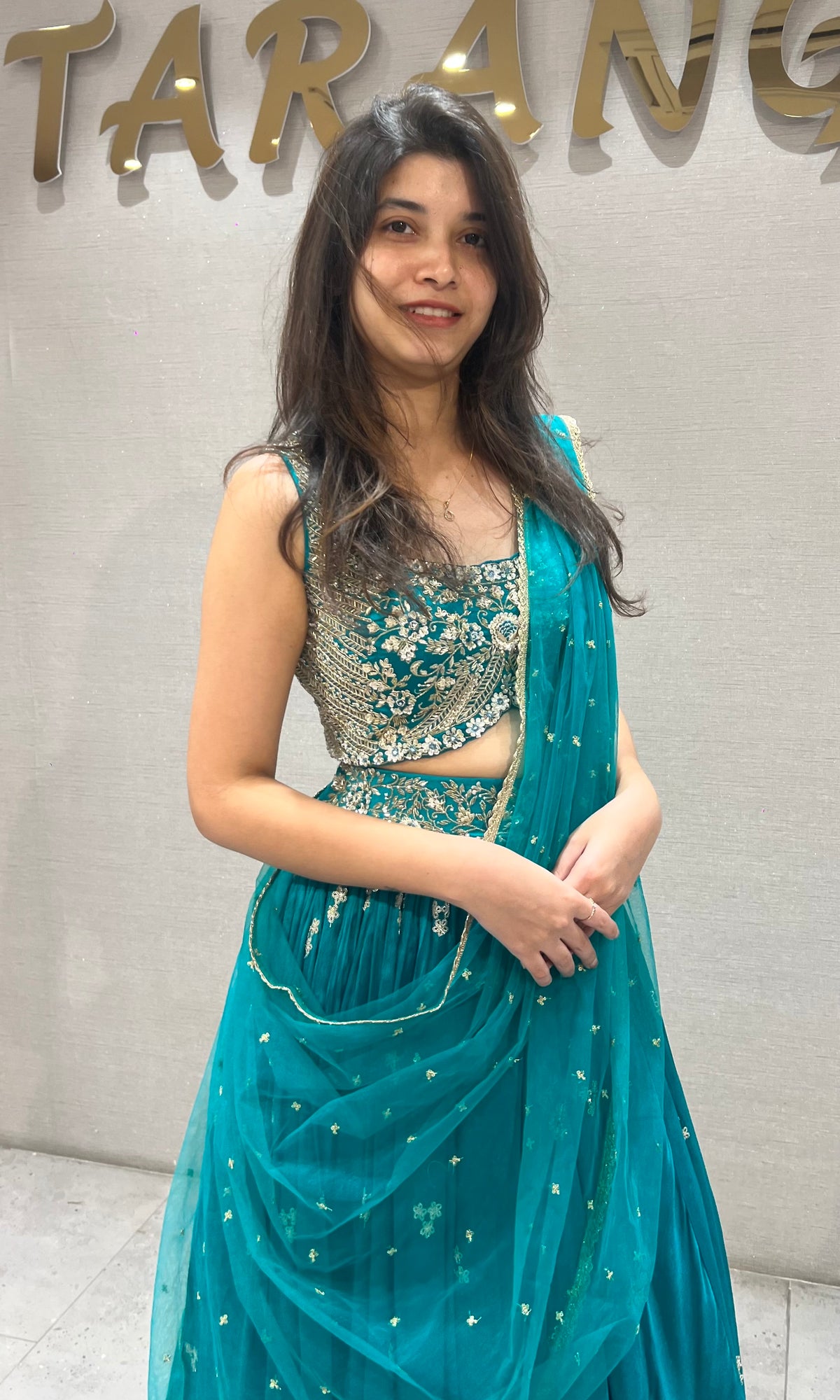 Teal blue gold zari embroidered lehenga